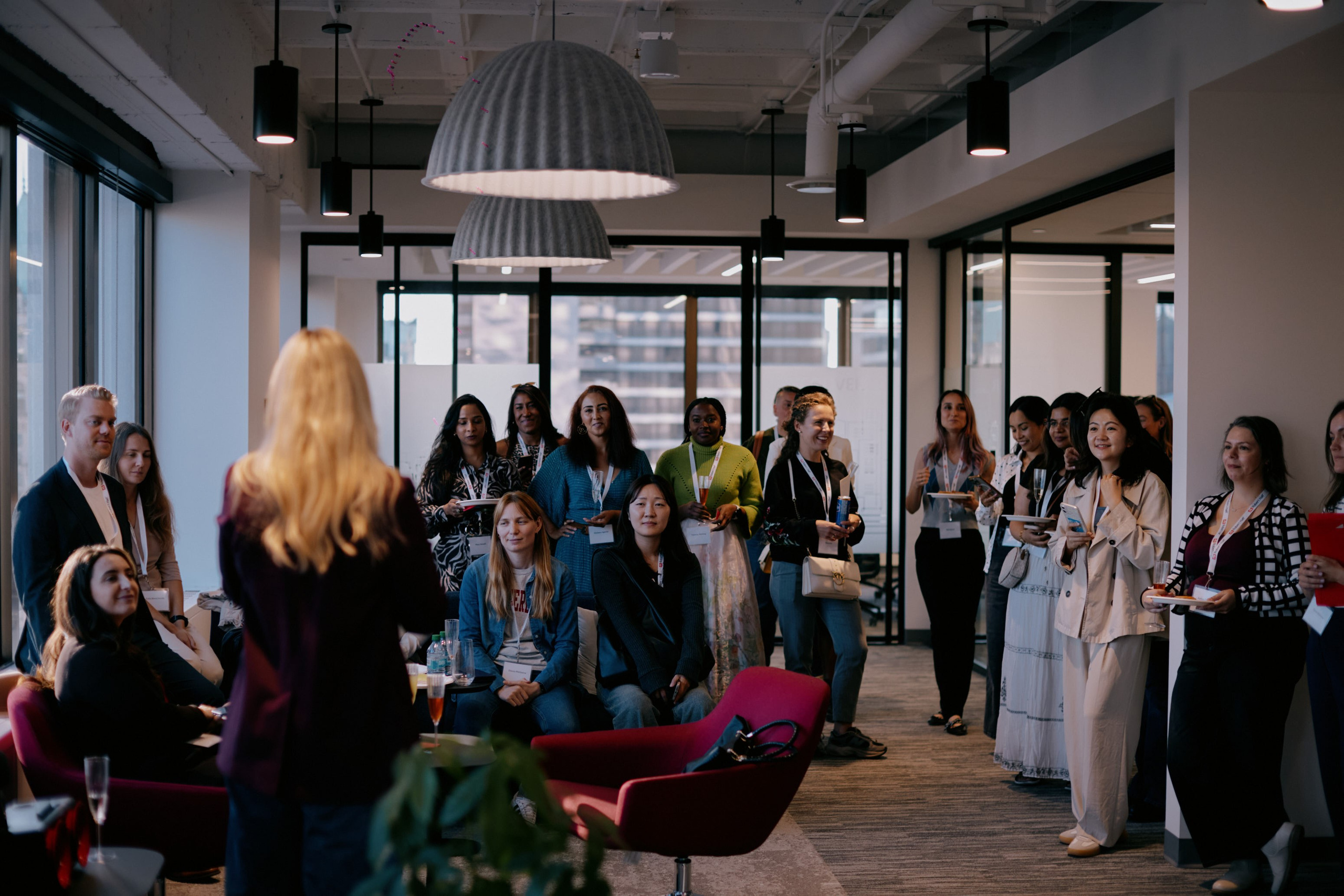 uests in conversation at a networking event in Vancouver