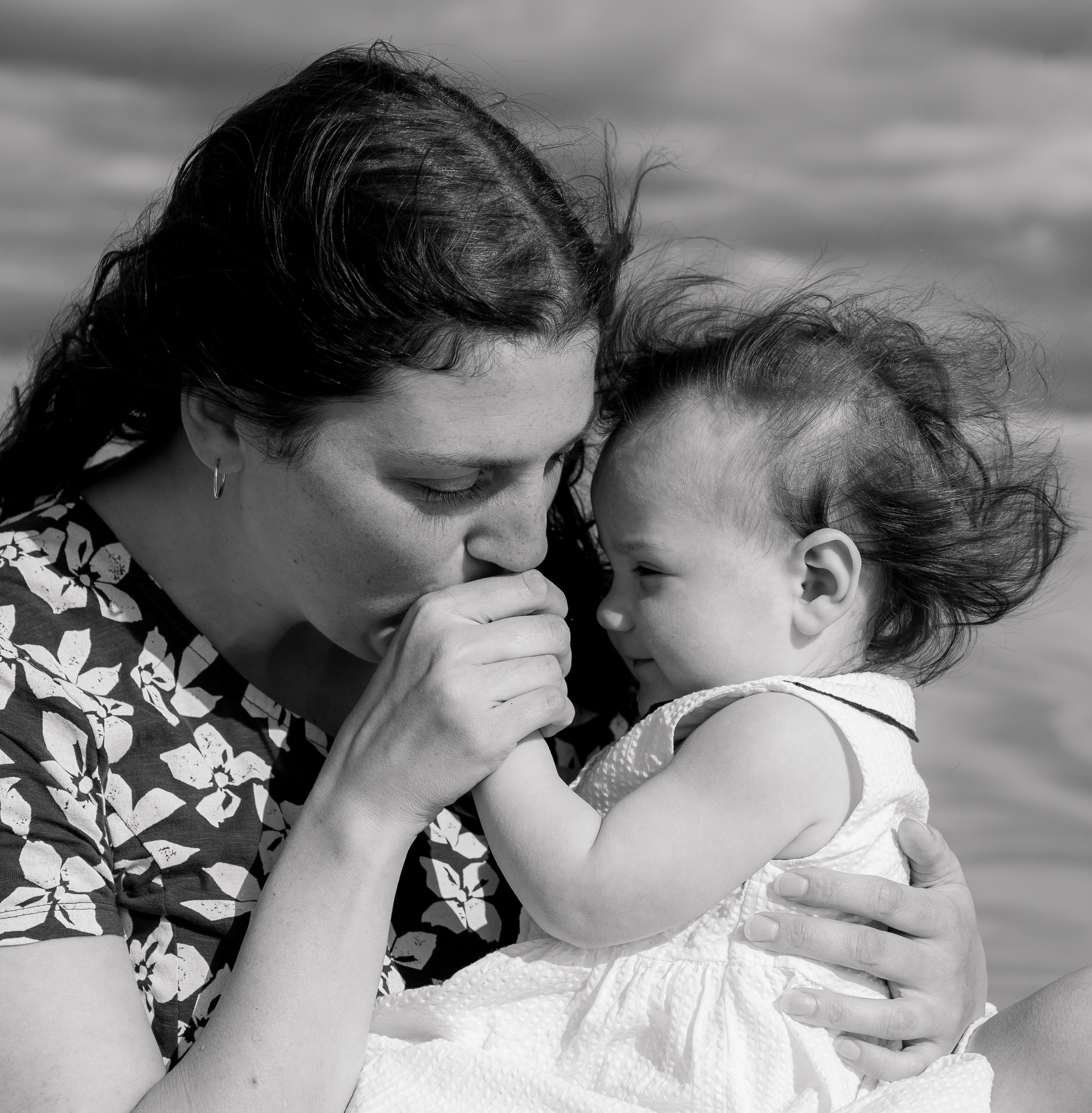 Darya and Mia at the ocean. Wedding and family photographer Ireland