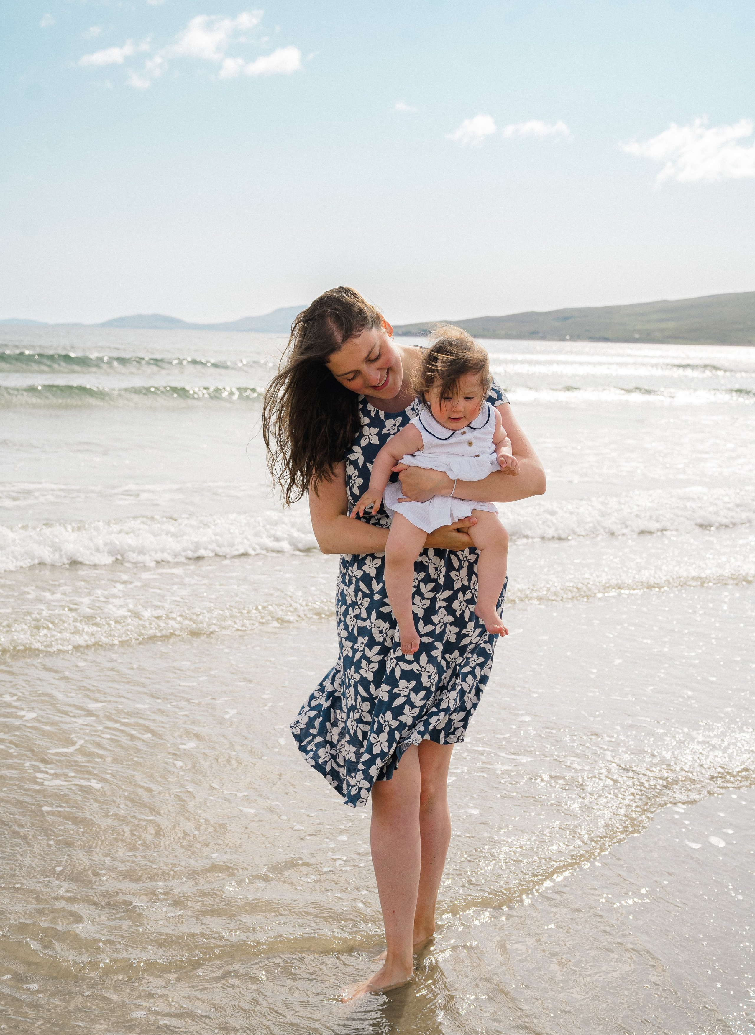 Darya and Mia at the ocean. Wedding and family photographer Ireland