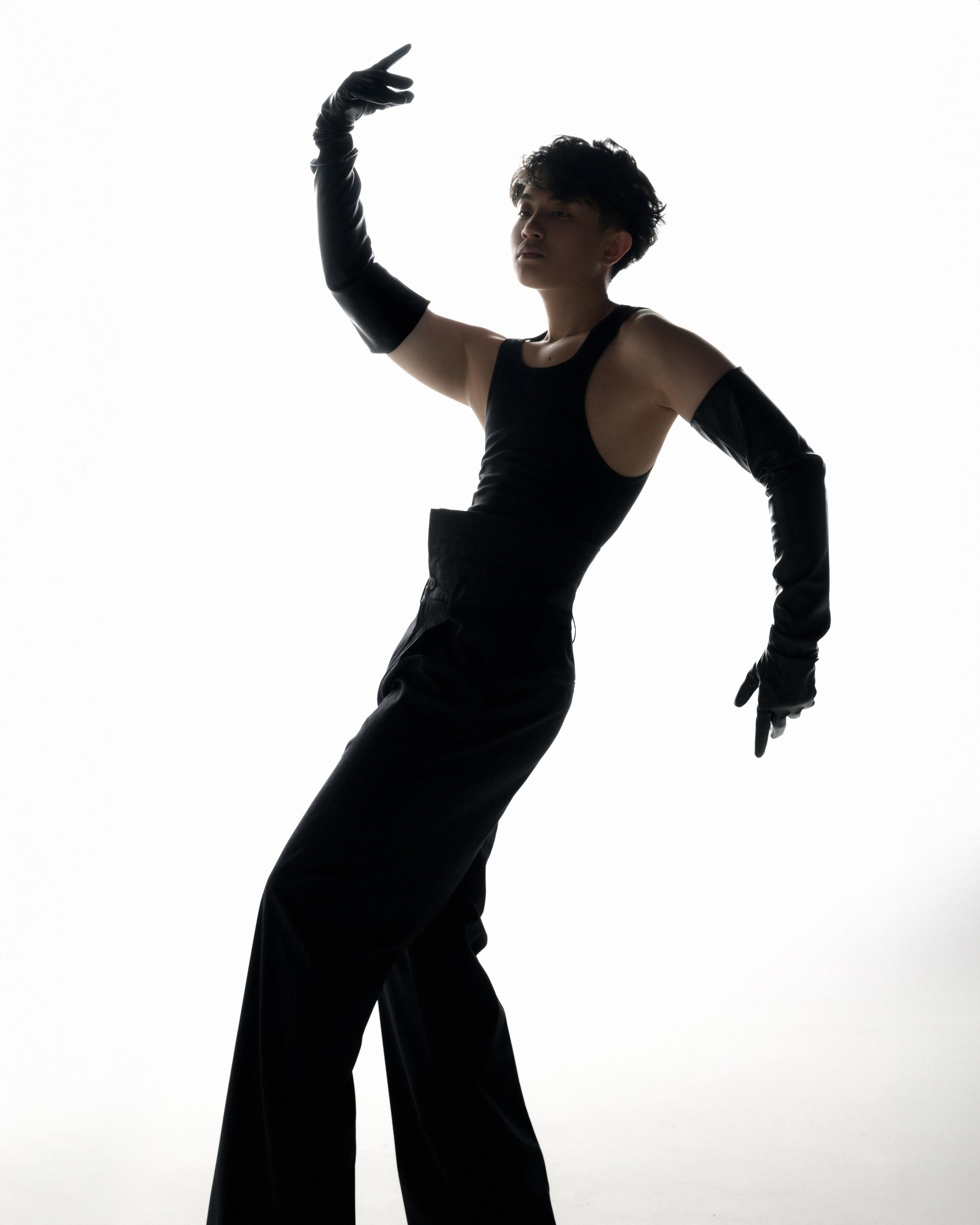 High-fashion male portrait in the studio, model test session for portfolio.