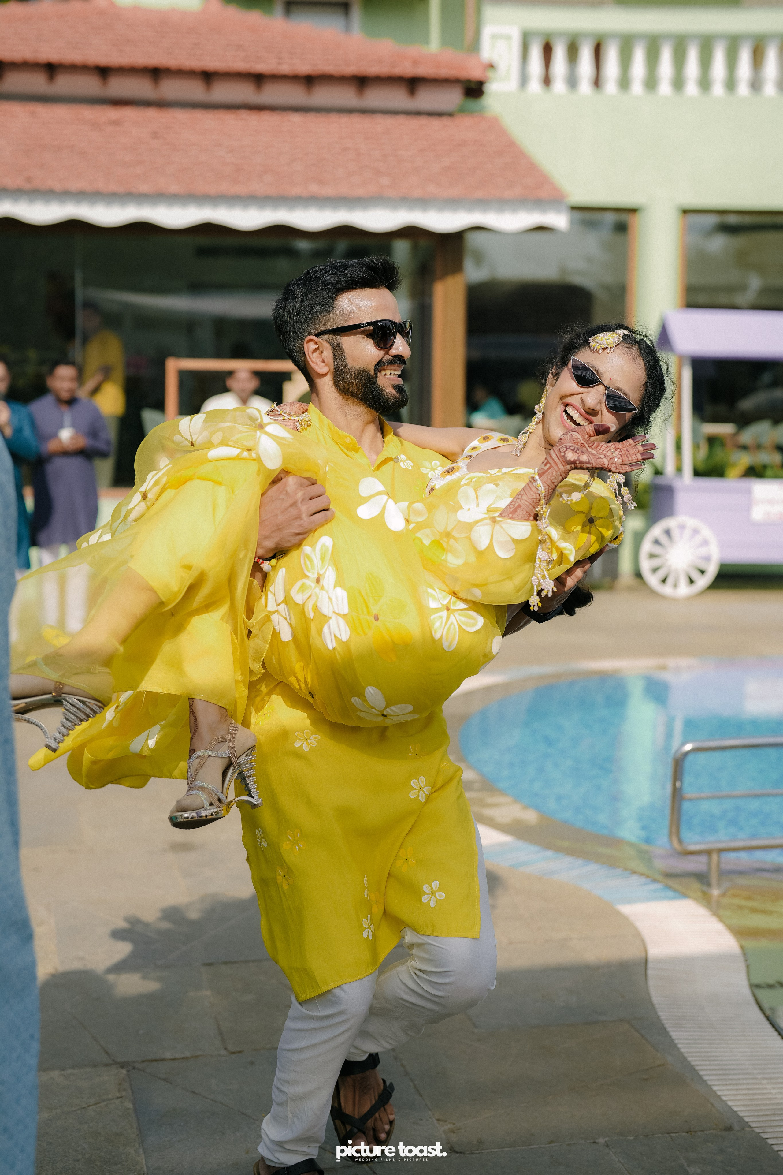 Haldi Hues Ft. Baebie & Goyal. Fine art Wedding Photographers in India & Canada