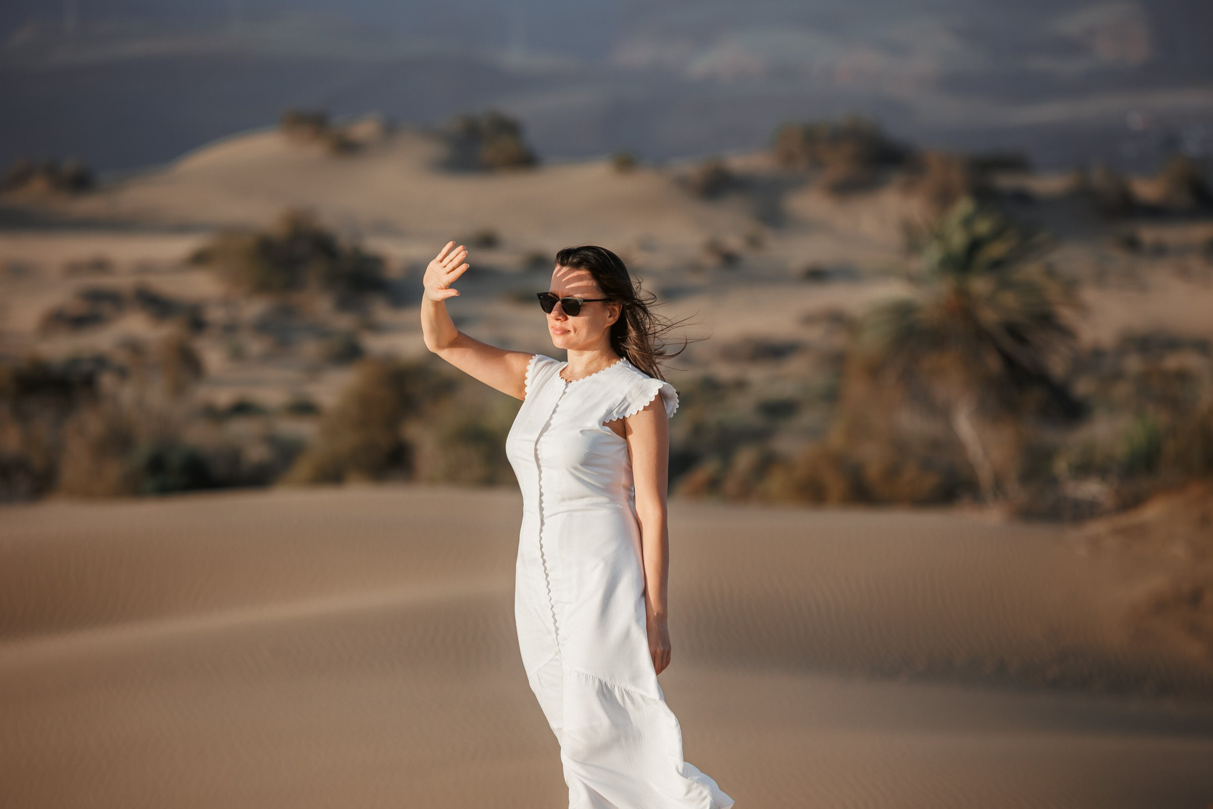 Maspalomas dunes Gran Canaria: a solo traveler posing for photographer