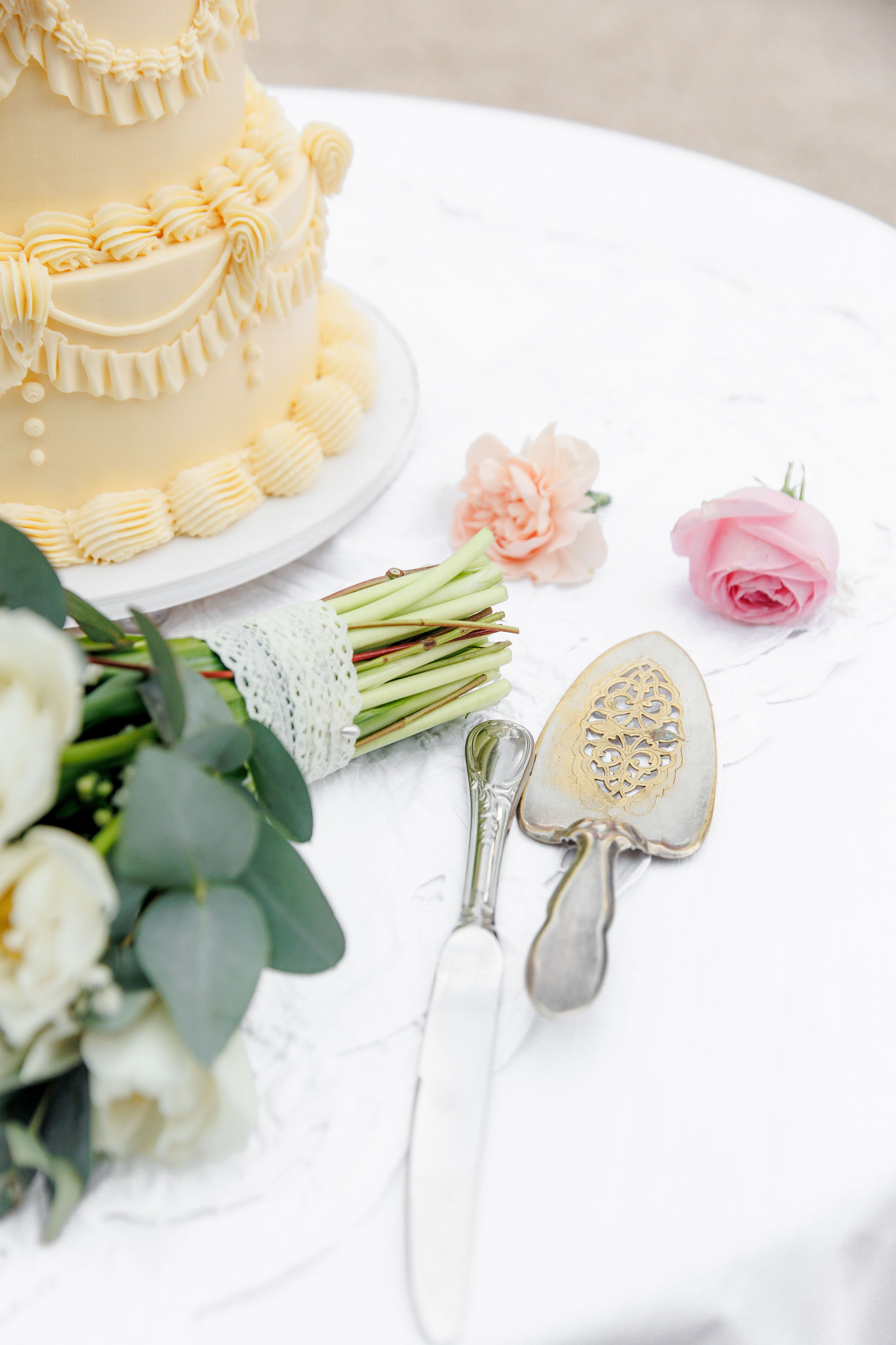 Beautiful ceremony decor featuring floral arrangements and elegant drapery, set up for a wedding in France.