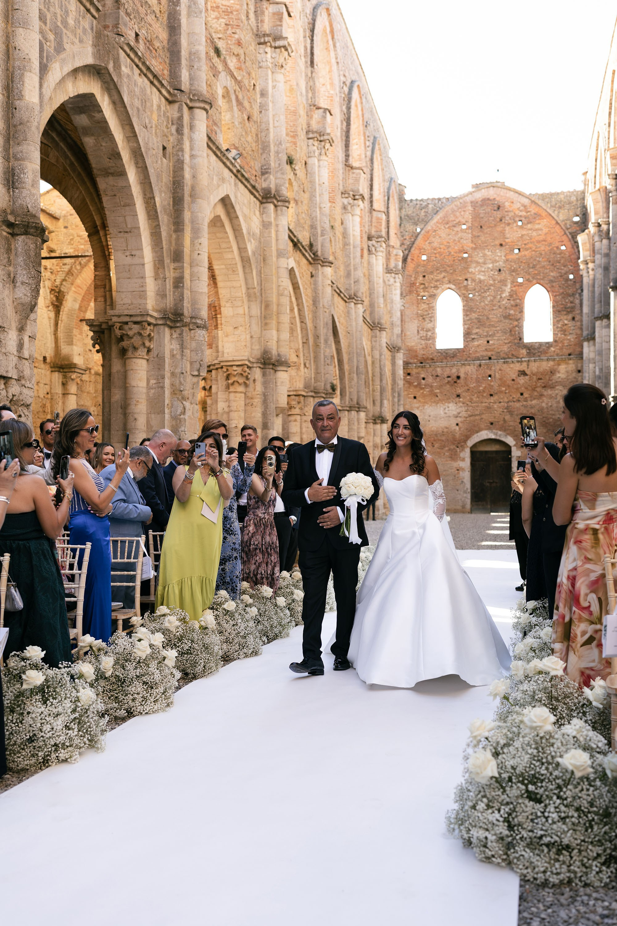 Ginevra and Avi — Abbazia di San Galgano, Tuscany. Destination Wedding Photographers and content creators based in Spain