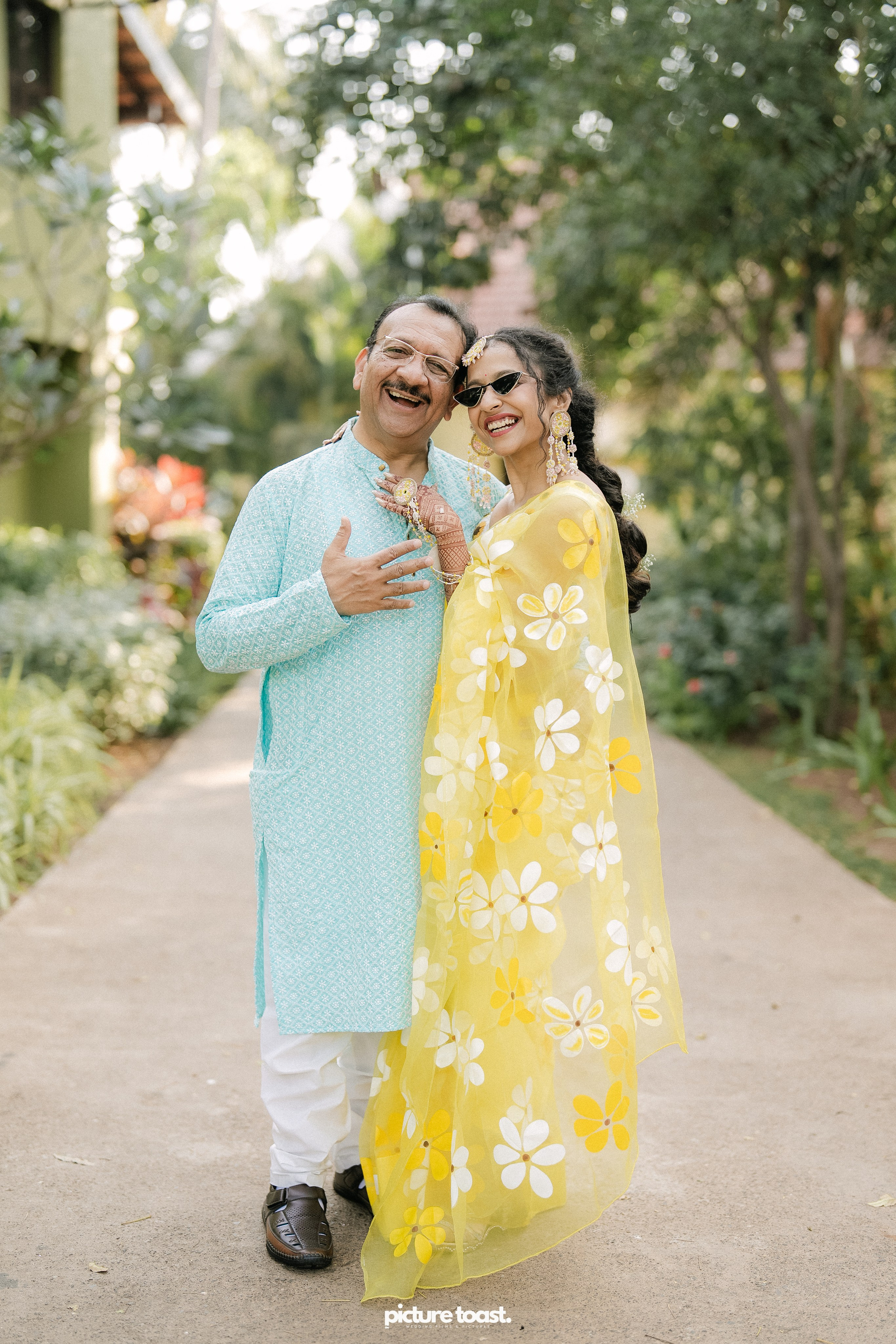 Haldi Hues Ft. Baebie & Goyal. Fine art Wedding Photographers in India & Canada