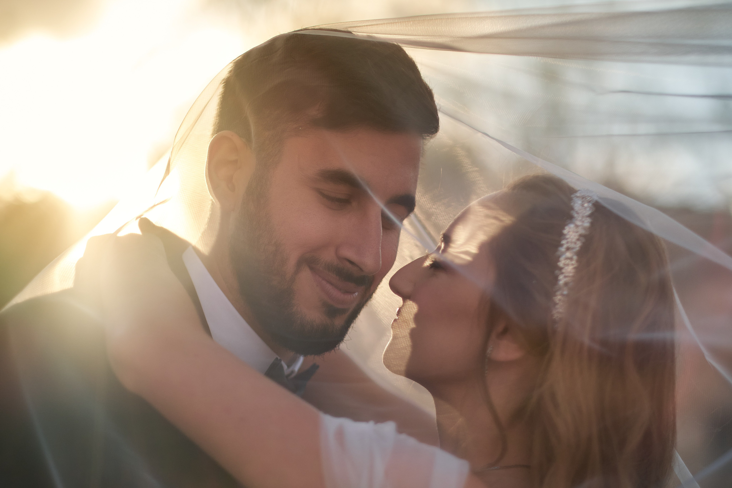 Love Story , wedding Romantic wedding couple portrait, bride with veil and groom in suit, emotional wedding photography by Maxim Polak Israel