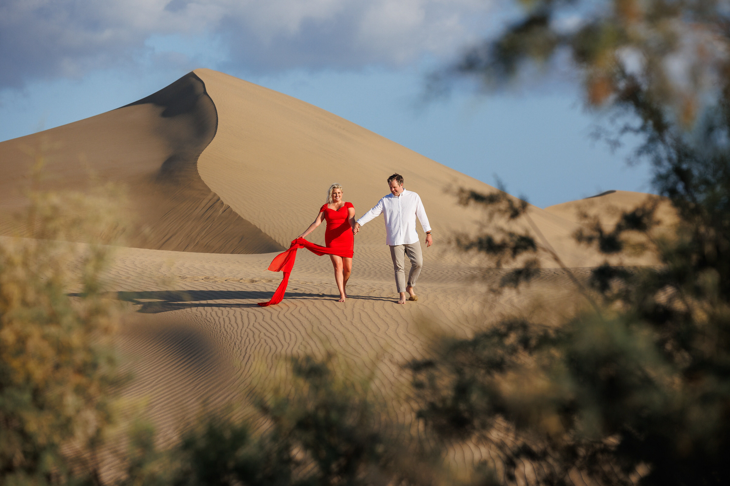 Love Story Unfolds: Red Dress Glamour in Maspalomas.