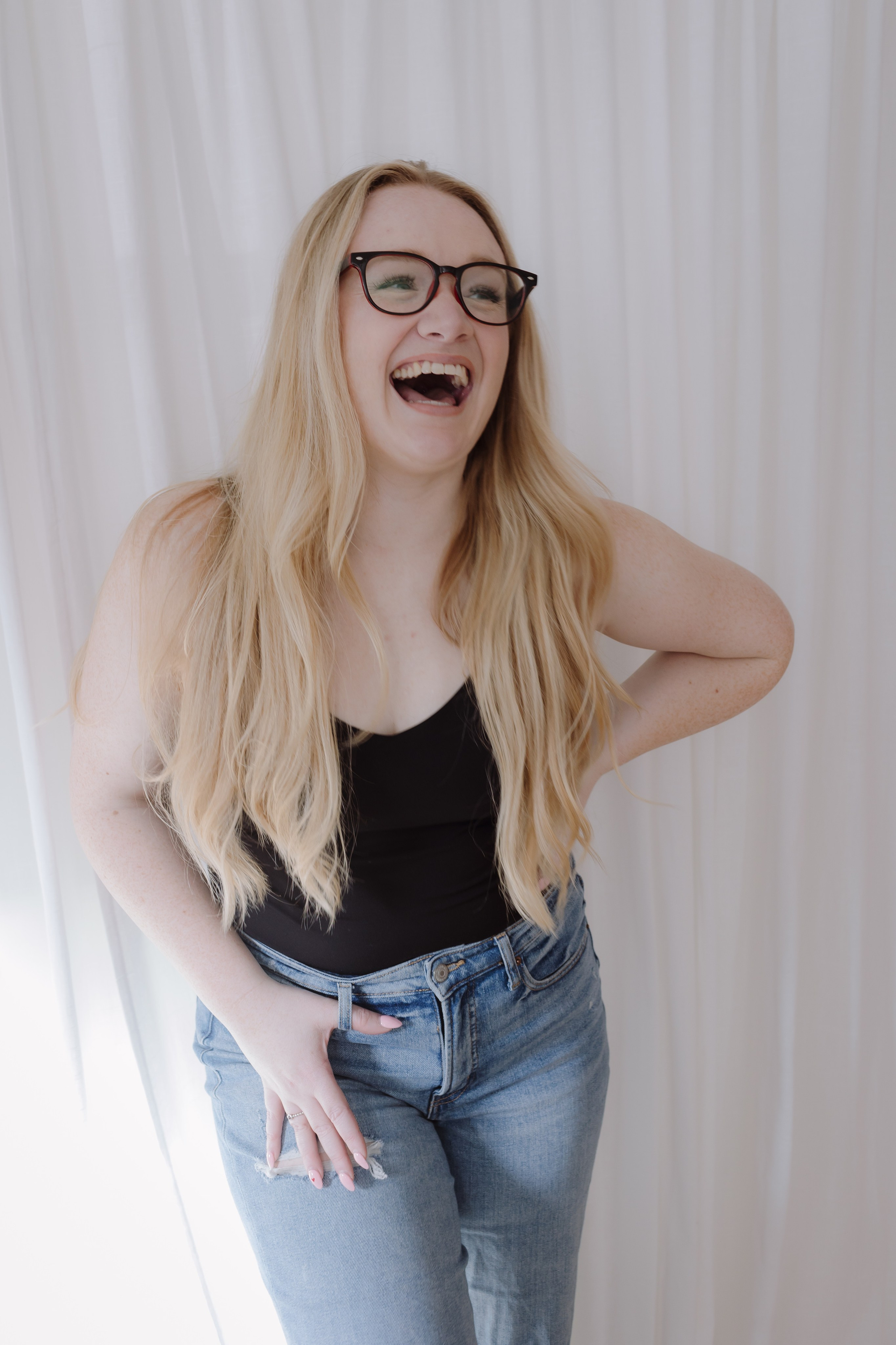 Blonde woman laughing 