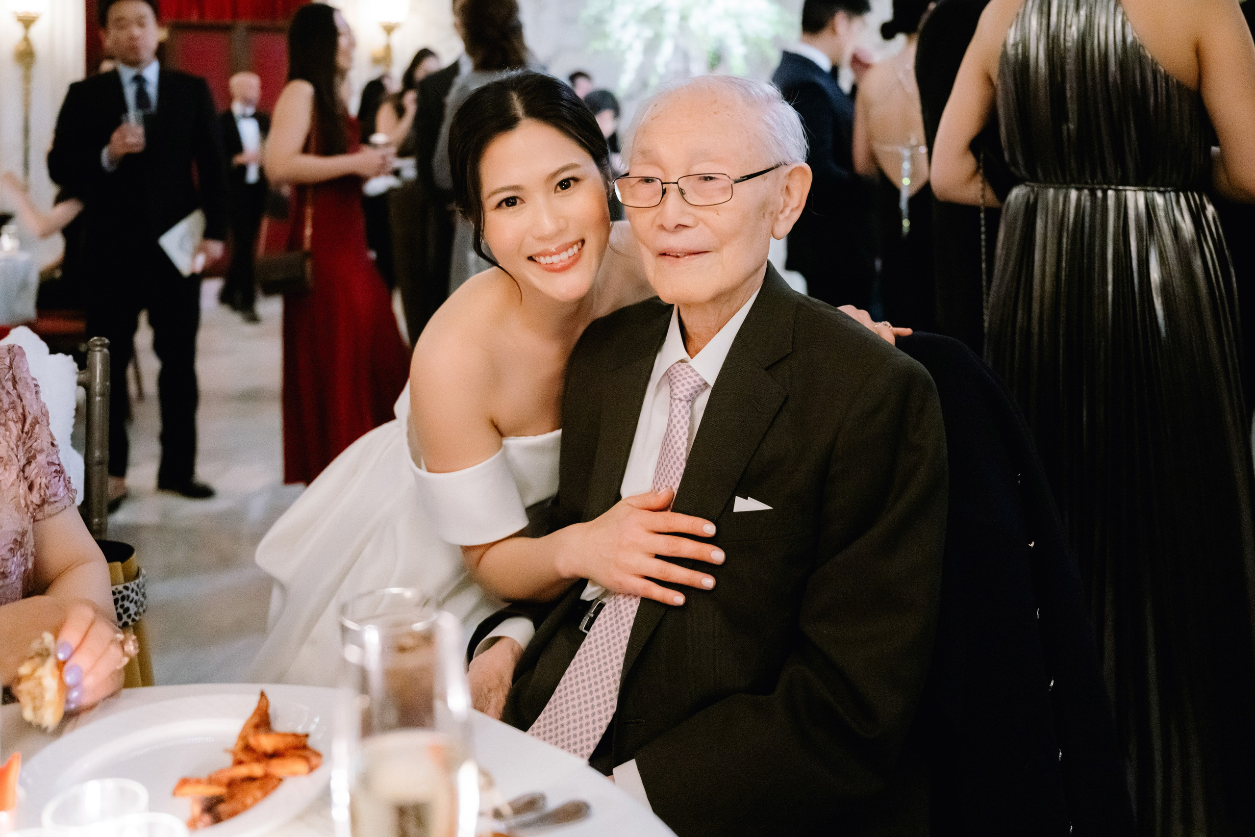 a man and woman sitting at a table