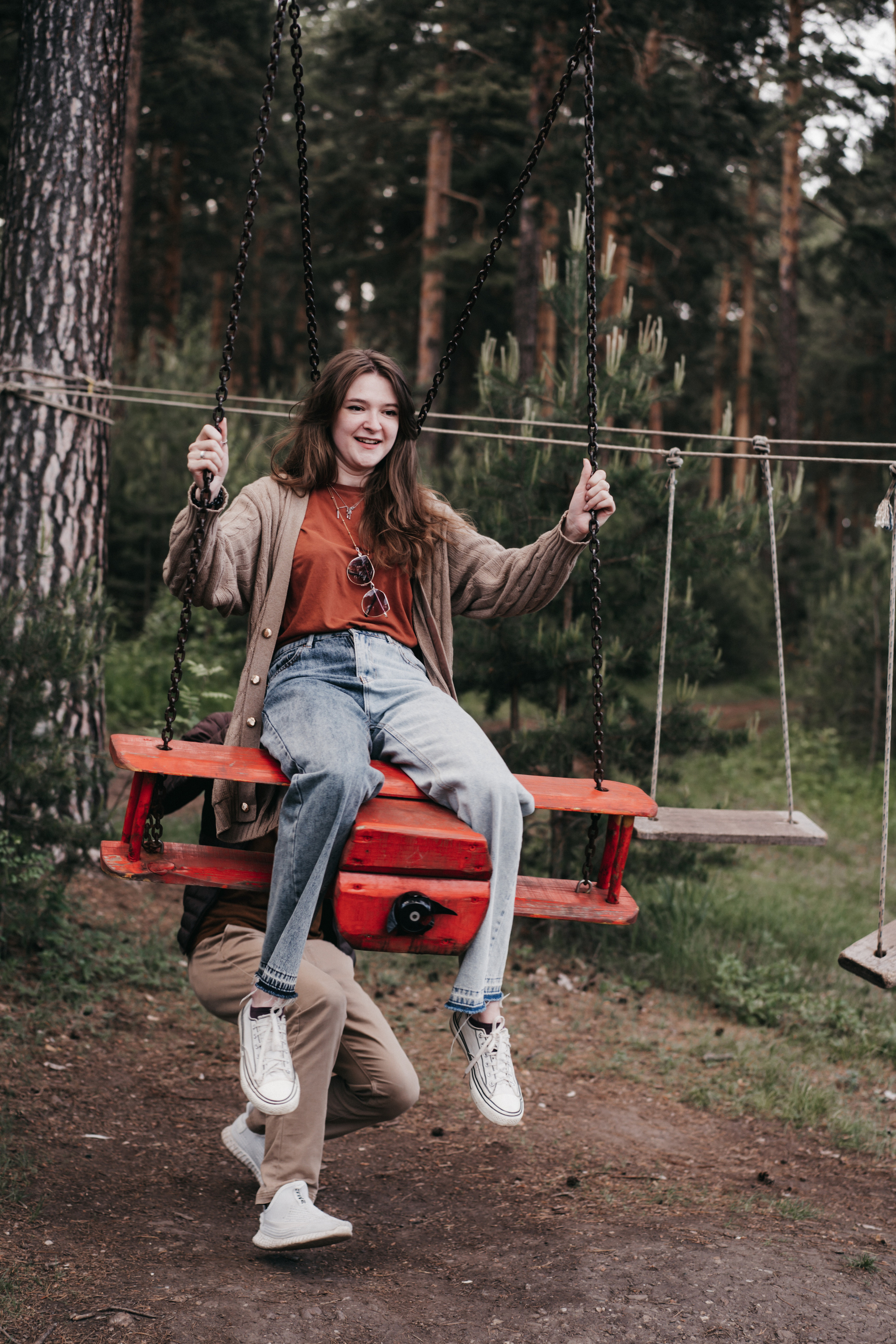 Photo of a couple in the forest. Portrait and wedding photographer in New York