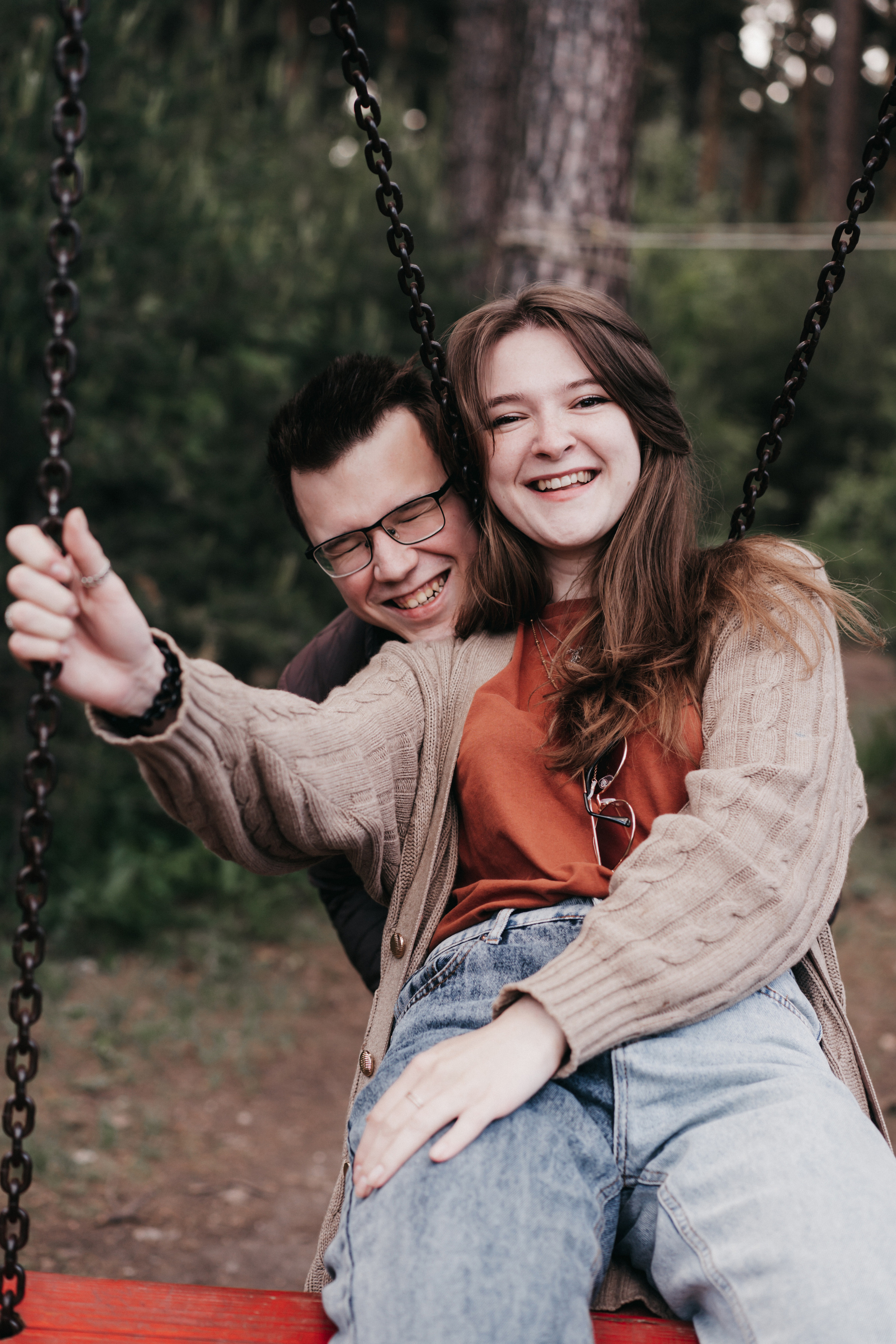 Photo of a couple in the forest. Portrait and wedding photographer in New York