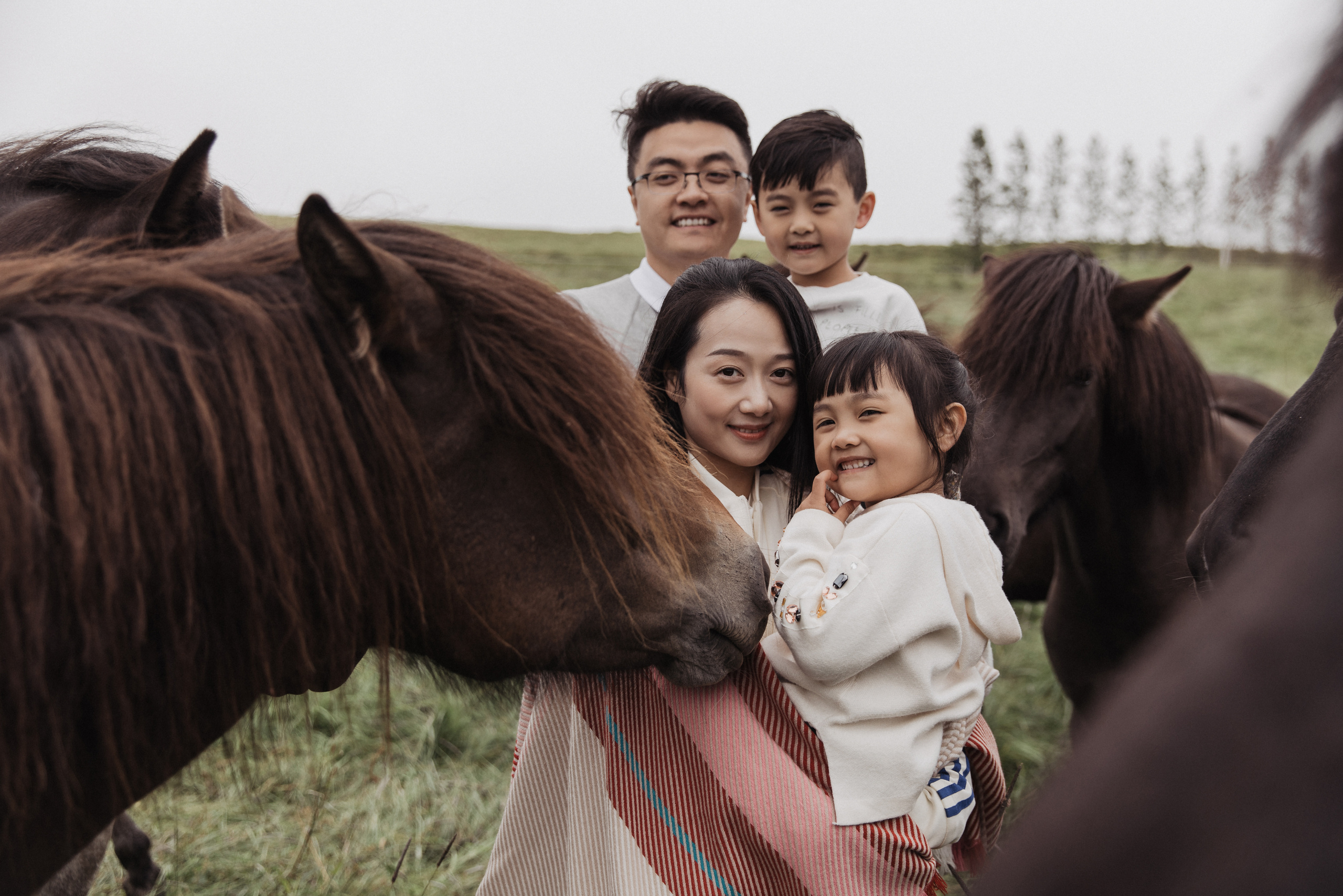 Family photoshoot at black sand beach in Iceland. Iceland elopement photographer & videographer
