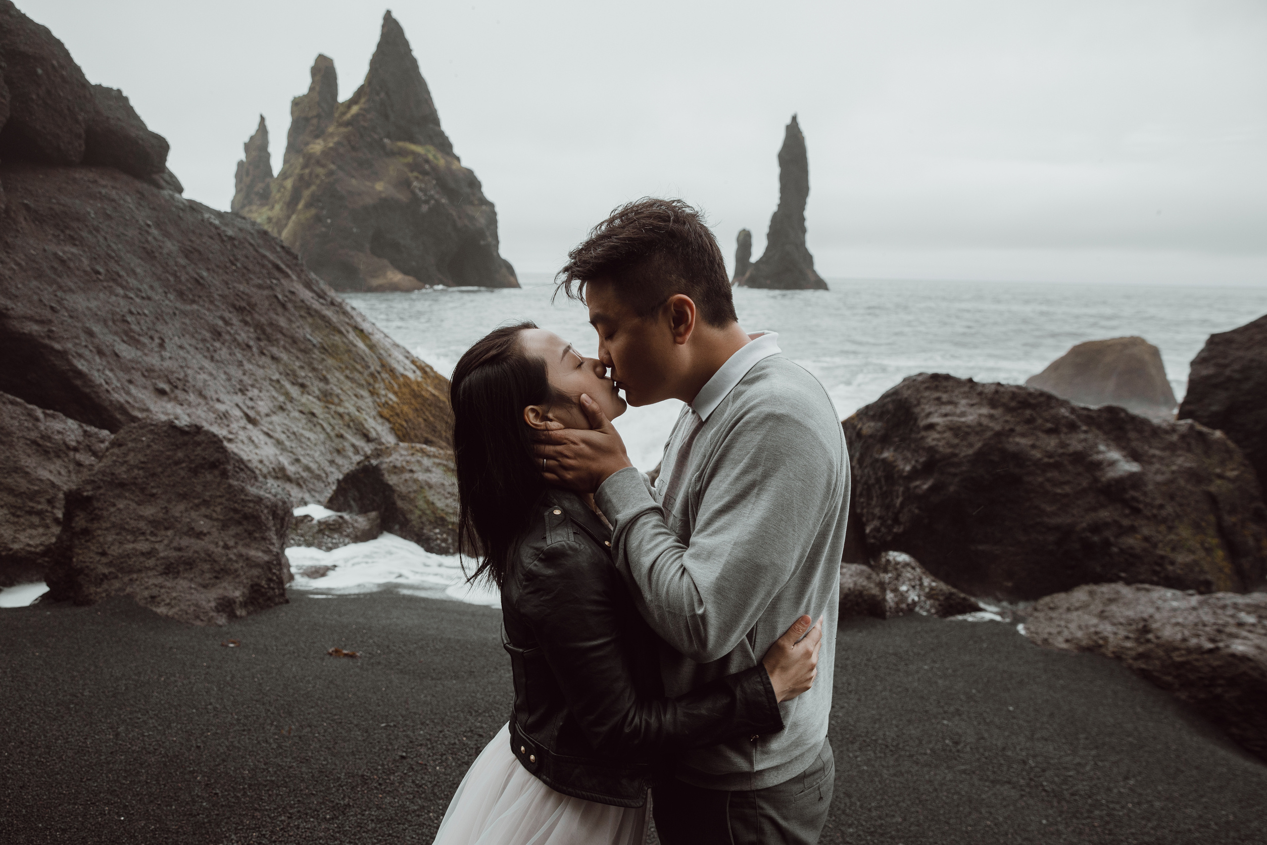 Family photoshoot at black sand beach in Iceland. Iceland elopement photographer & videographer