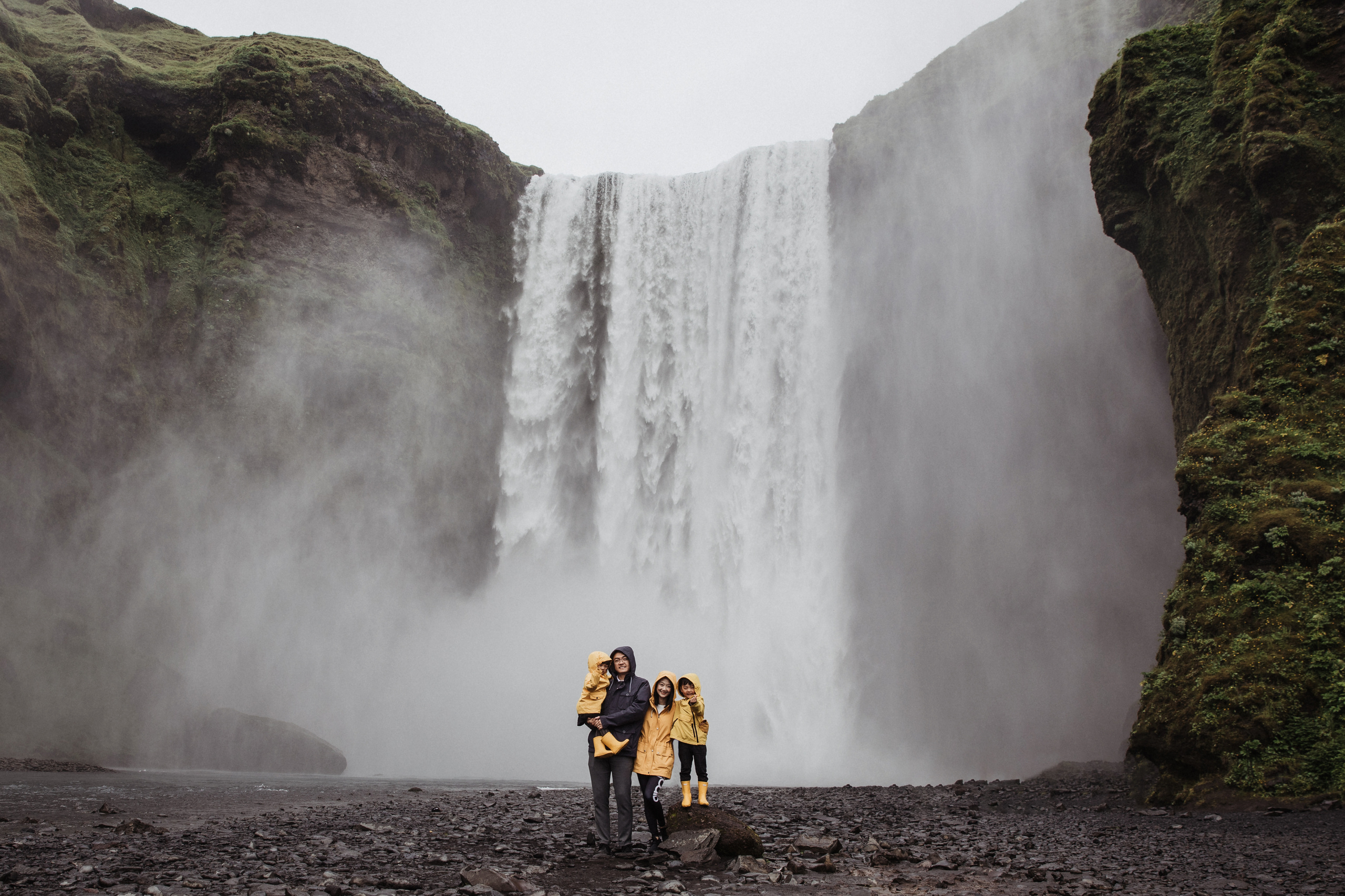 Family photoshoot at black sand beach in Iceland. Iceland elopement photographer & videographer