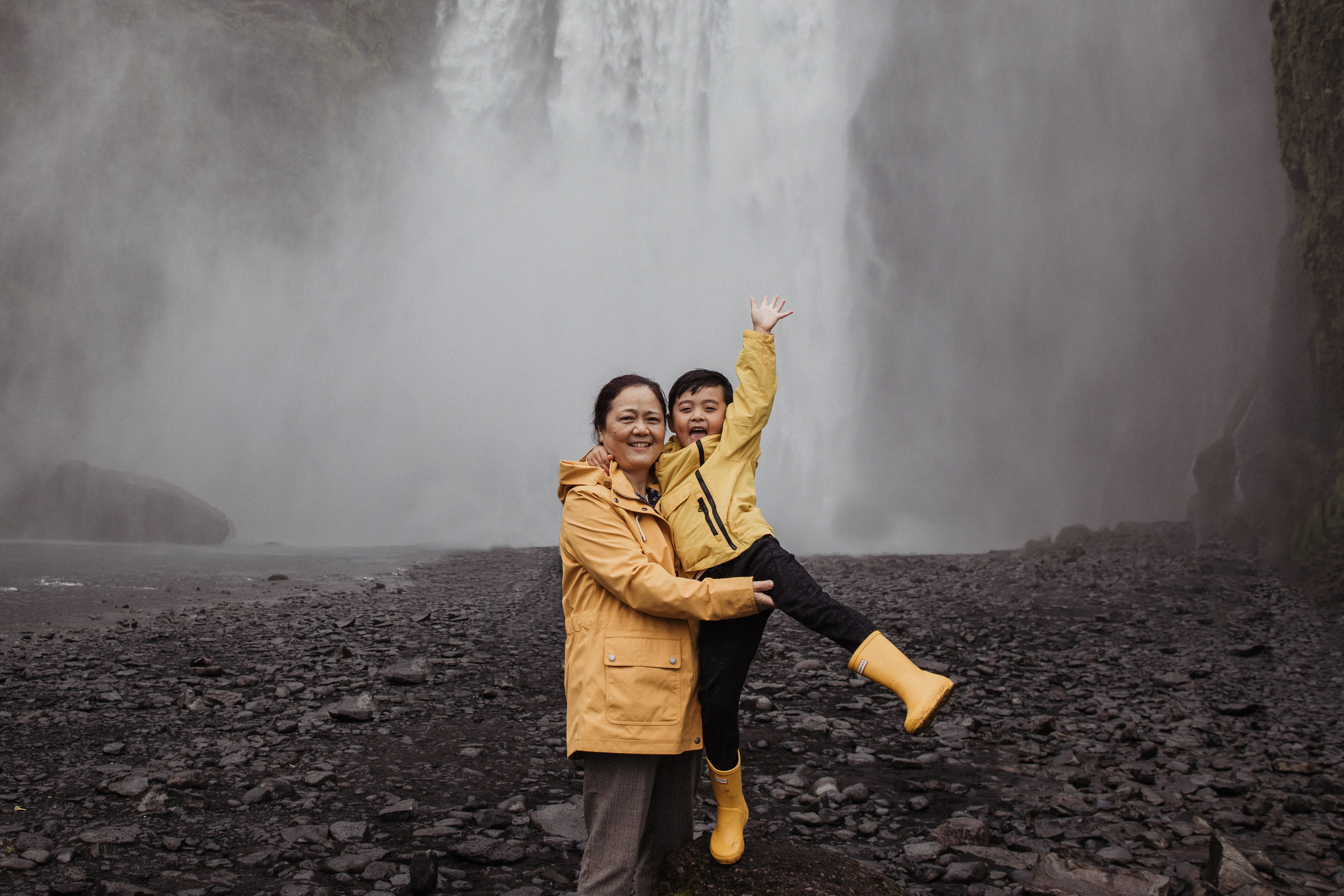 Family photoshoot at black sand beach in Iceland. Iceland elopement photographer & videographer