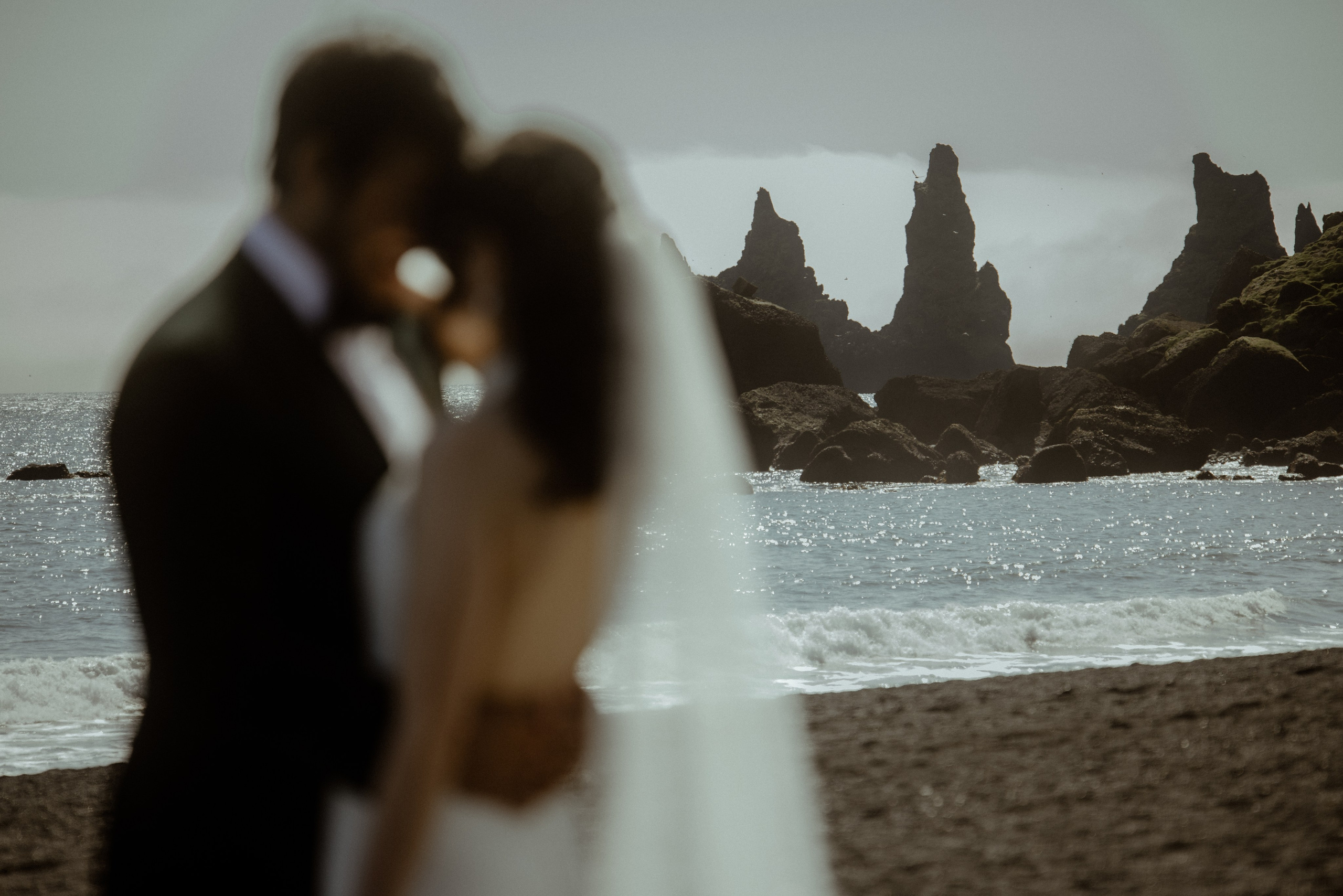 Iceland elopement at endless black sand beach. Iceland elopement photographer & videographer