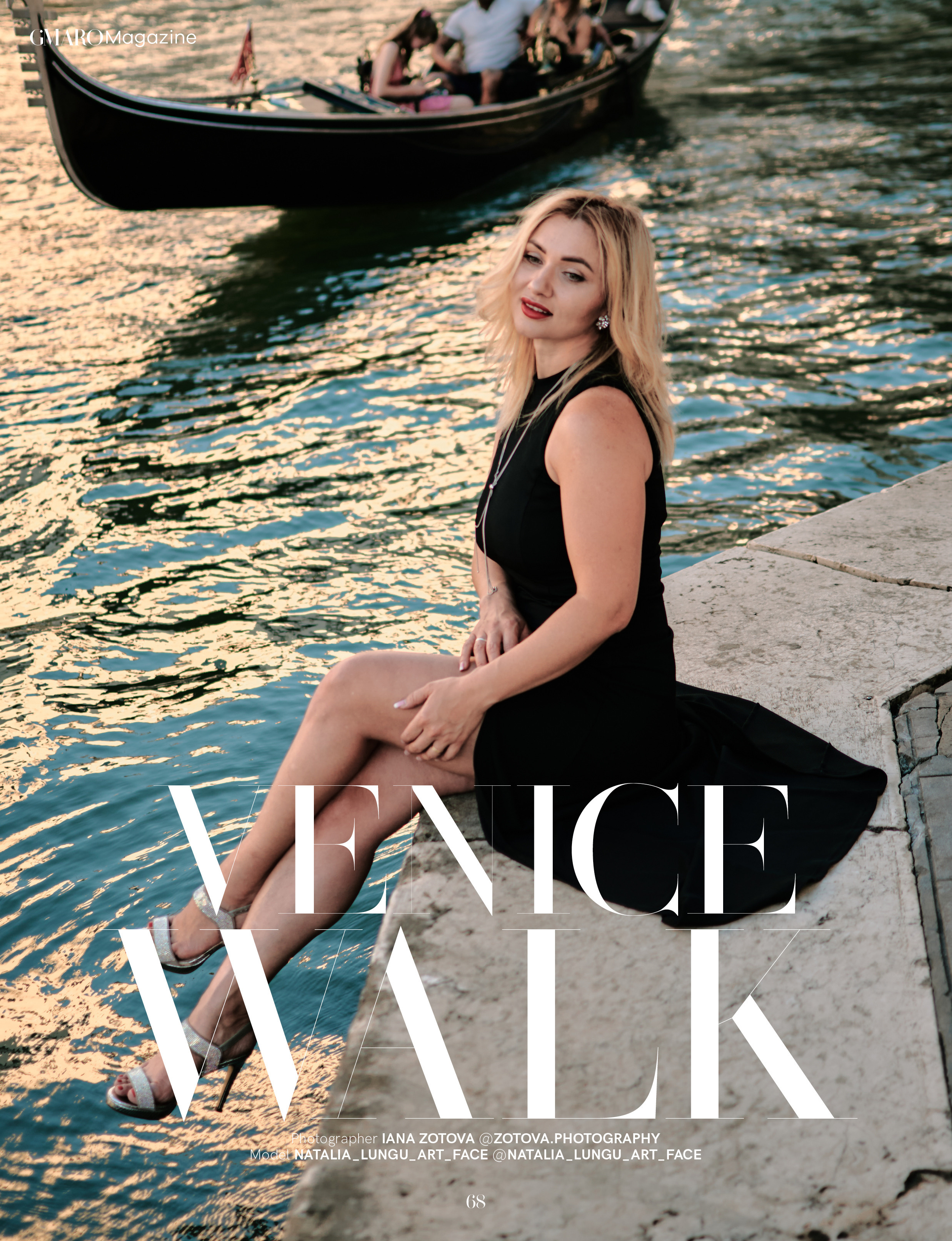 A mesmerizing young woman in a black dress sits on a gondola, gliding through the narrow streets of Venice. The black and white striped shirt of the gondolier is visible in the background. The woman's silky hair flows in the breeze, and her captivating eyes gaze off into the distance. The winding streets of Venice create a beautiful, romantic backdrop for this enchanting photo.