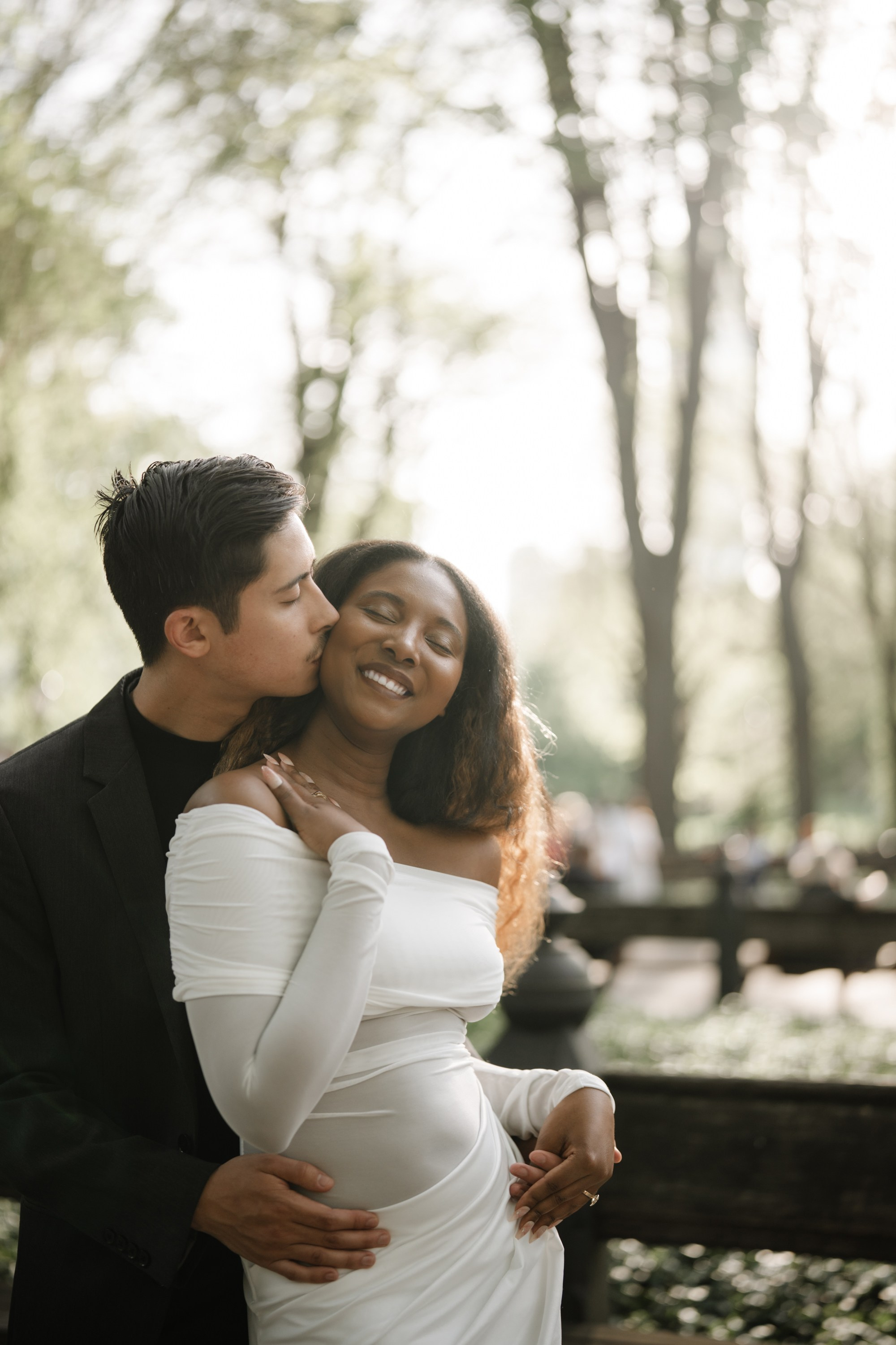 Engagement photo shoot in Central Park in spring. Portrait and wedding photographer in New York