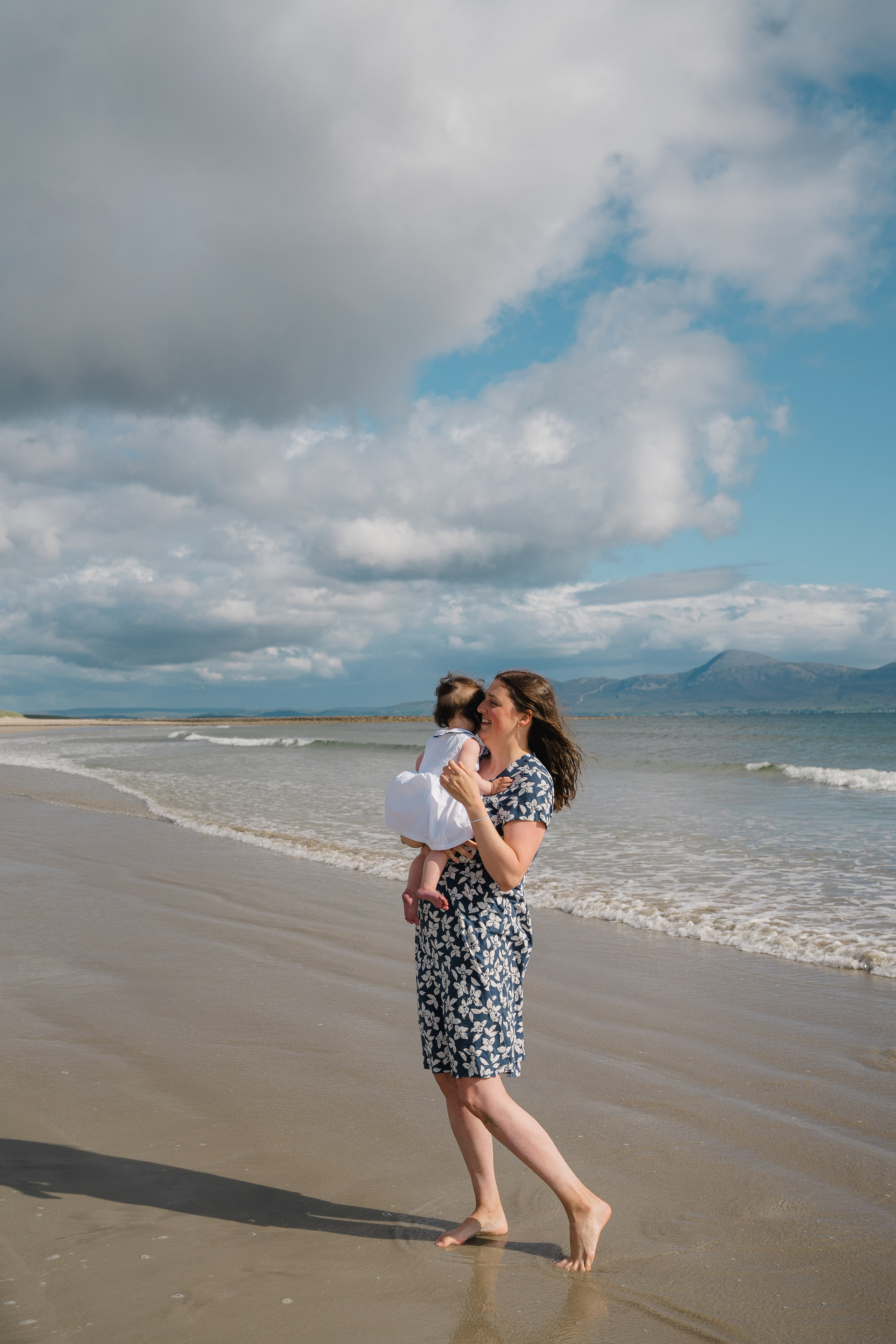 Darya and Mia at the ocean. Wedding and family photographer Ireland