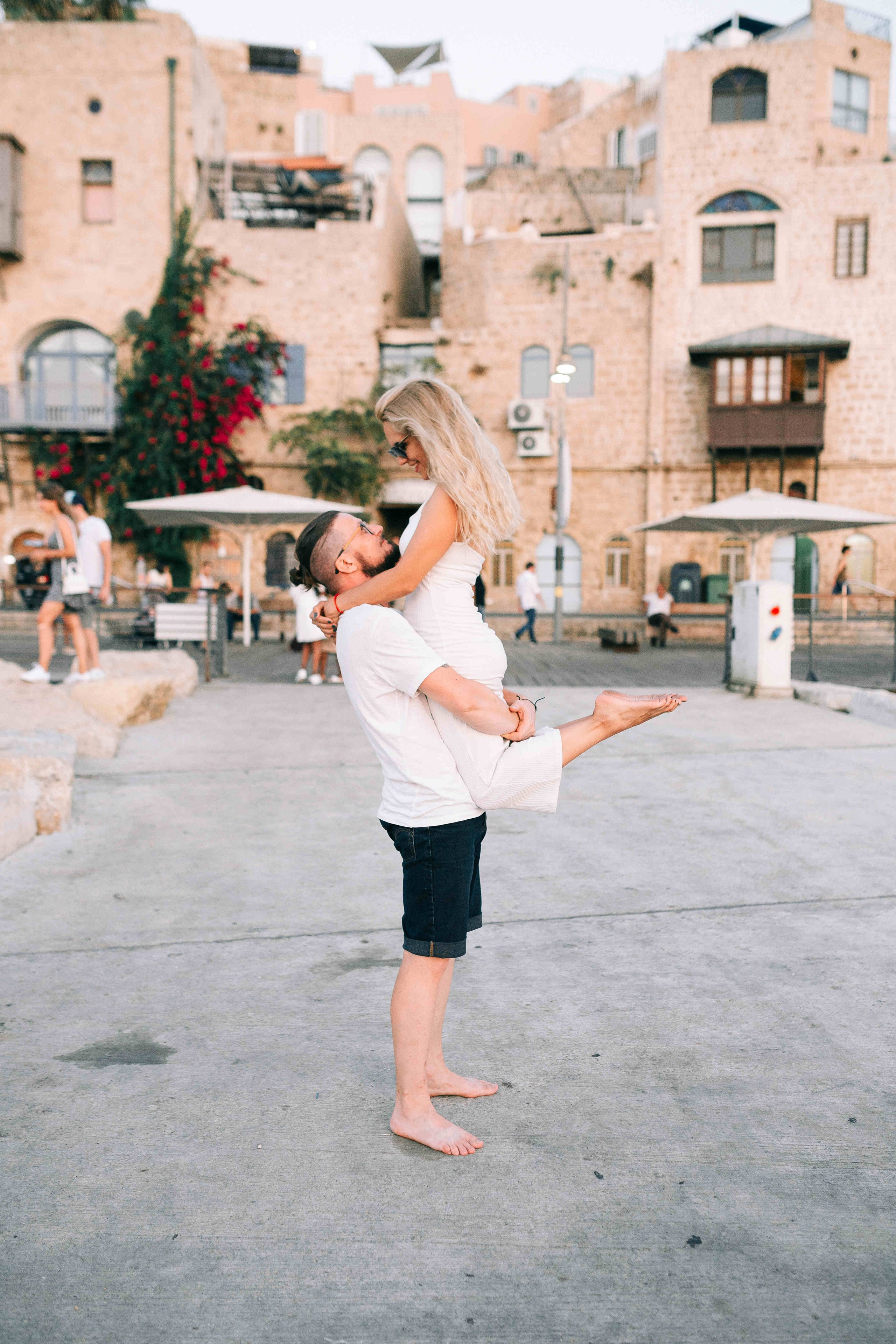 SUNSET IN JAFFO PORT. PHOTOGRAPHER IN ISRAEL