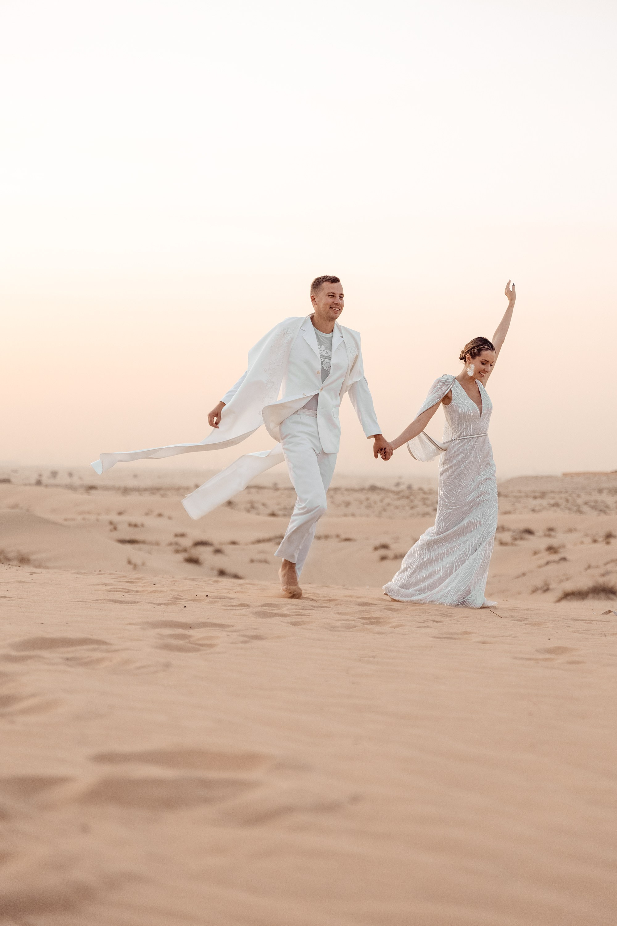 Bride and groom are happy after the ceremony is finished. Dubai, United Arab Emirates