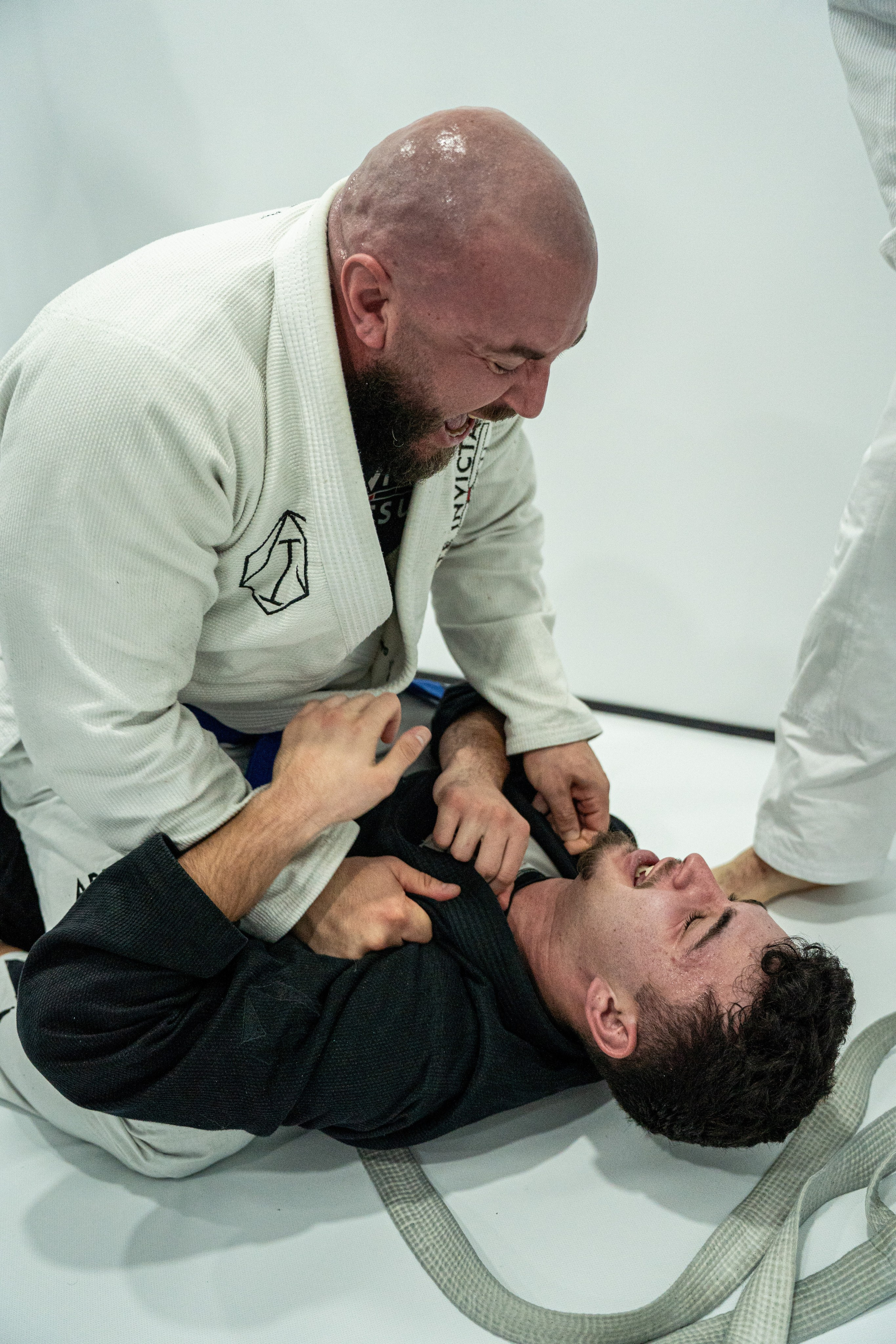 Arte Invicta — Graduação de Faixa. Frames by Giovani Braga