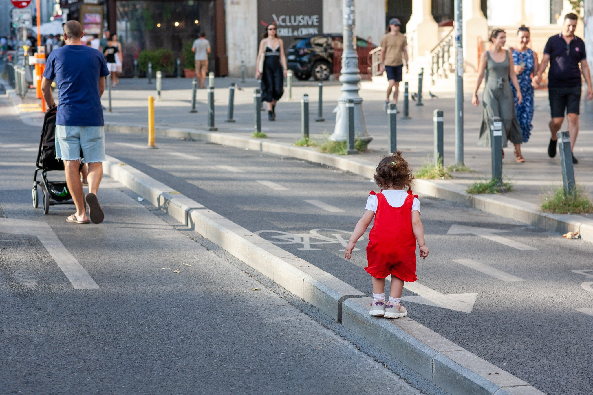 Color street. Humanistic street photographer in Bucharest