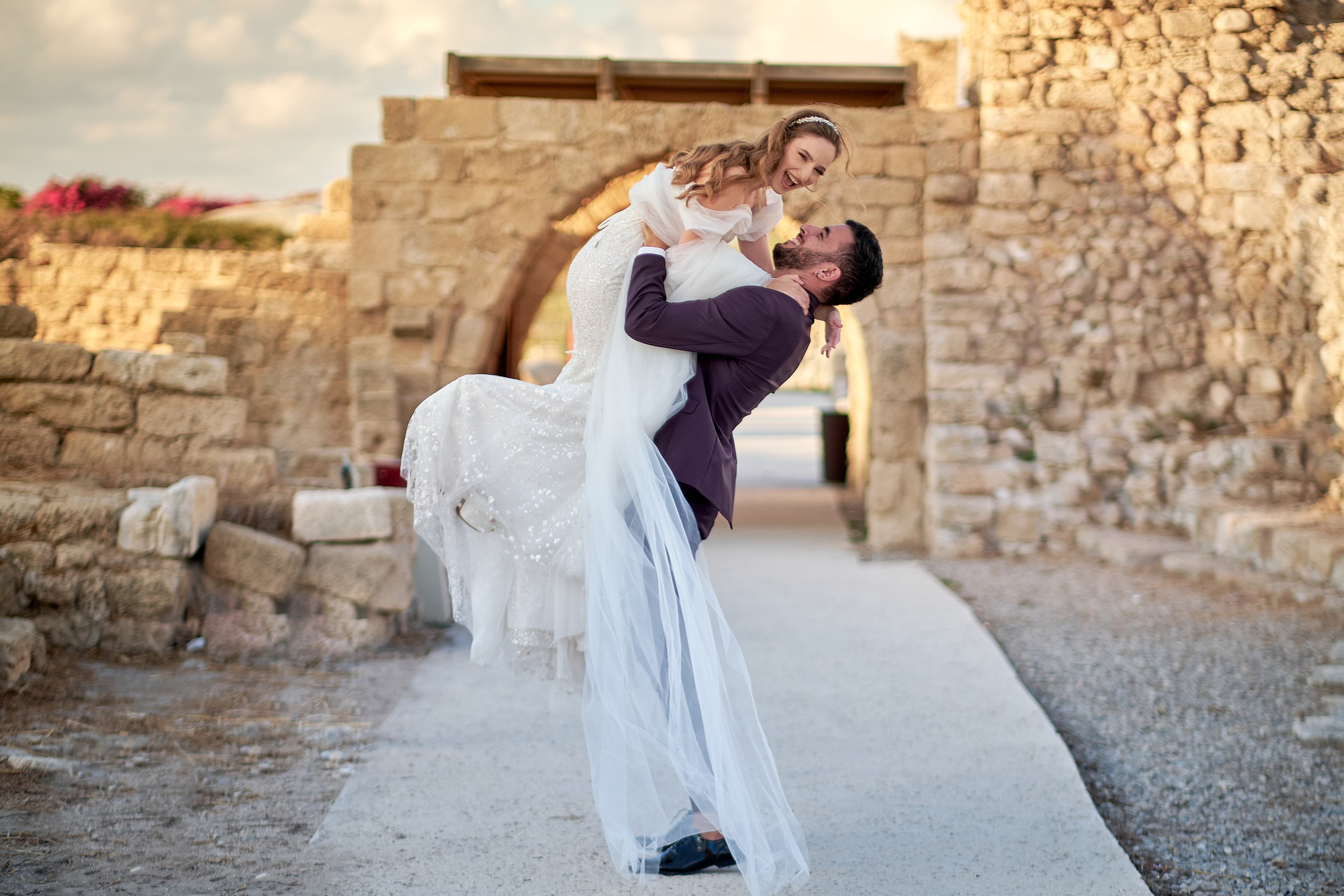 Love Story , wedding Romantic wedding couple portrait, bride with veil and groom in suit, emotional wedding photography by Maxim Polak Israel