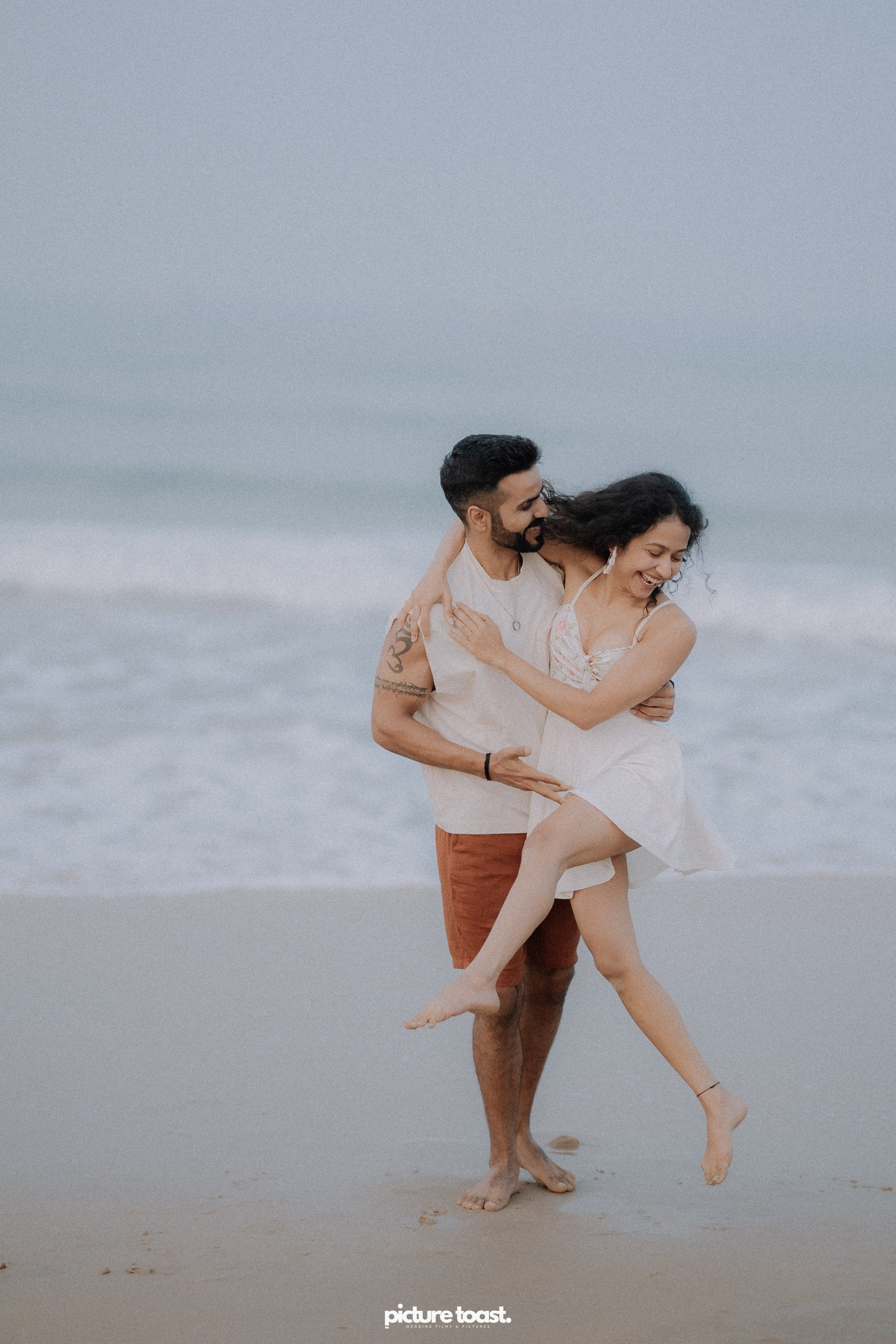 Love In The Beach. Fine art Wedding Photographers in India & Canada