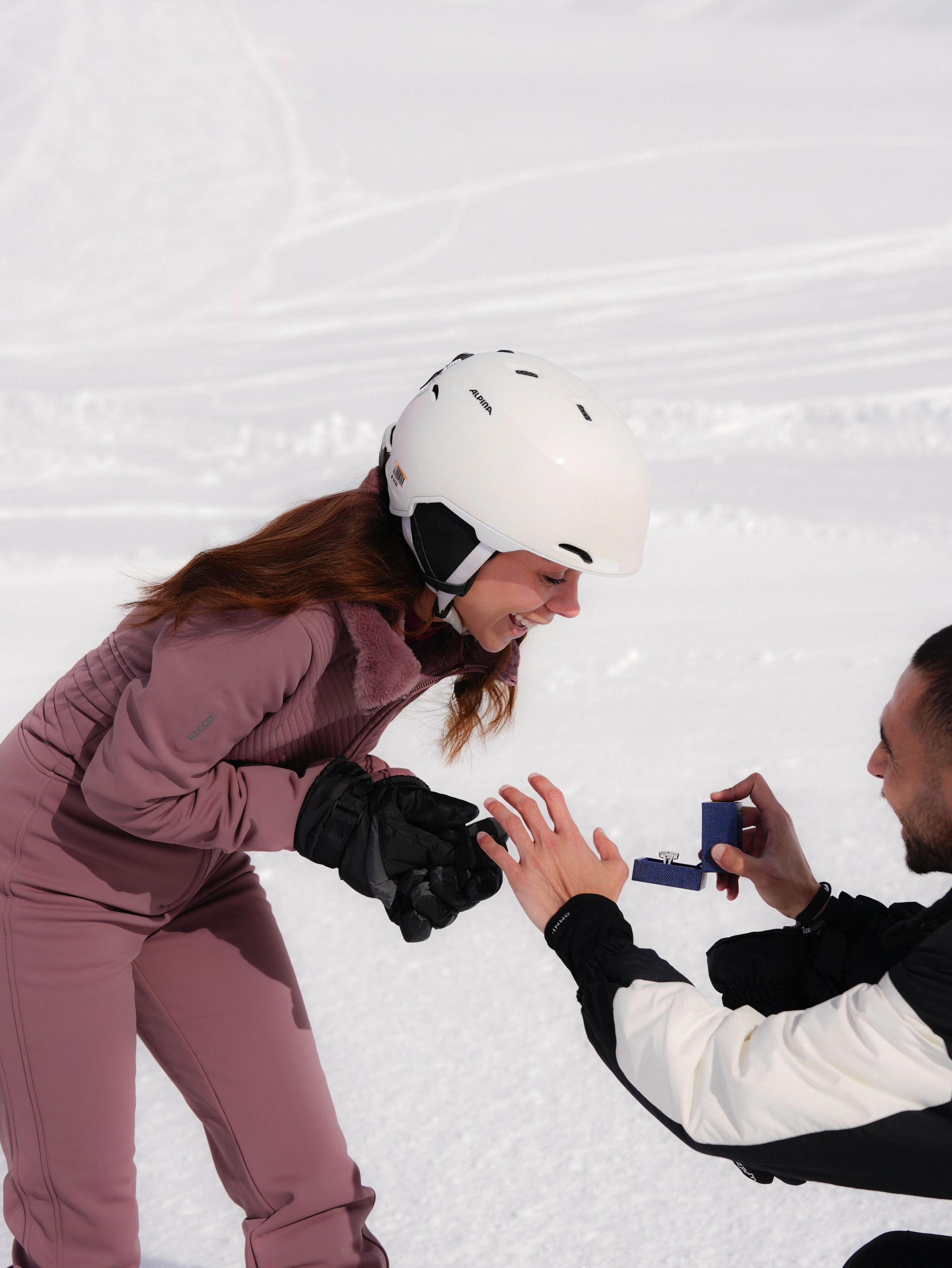 Woman reacting to engagement in winter setting