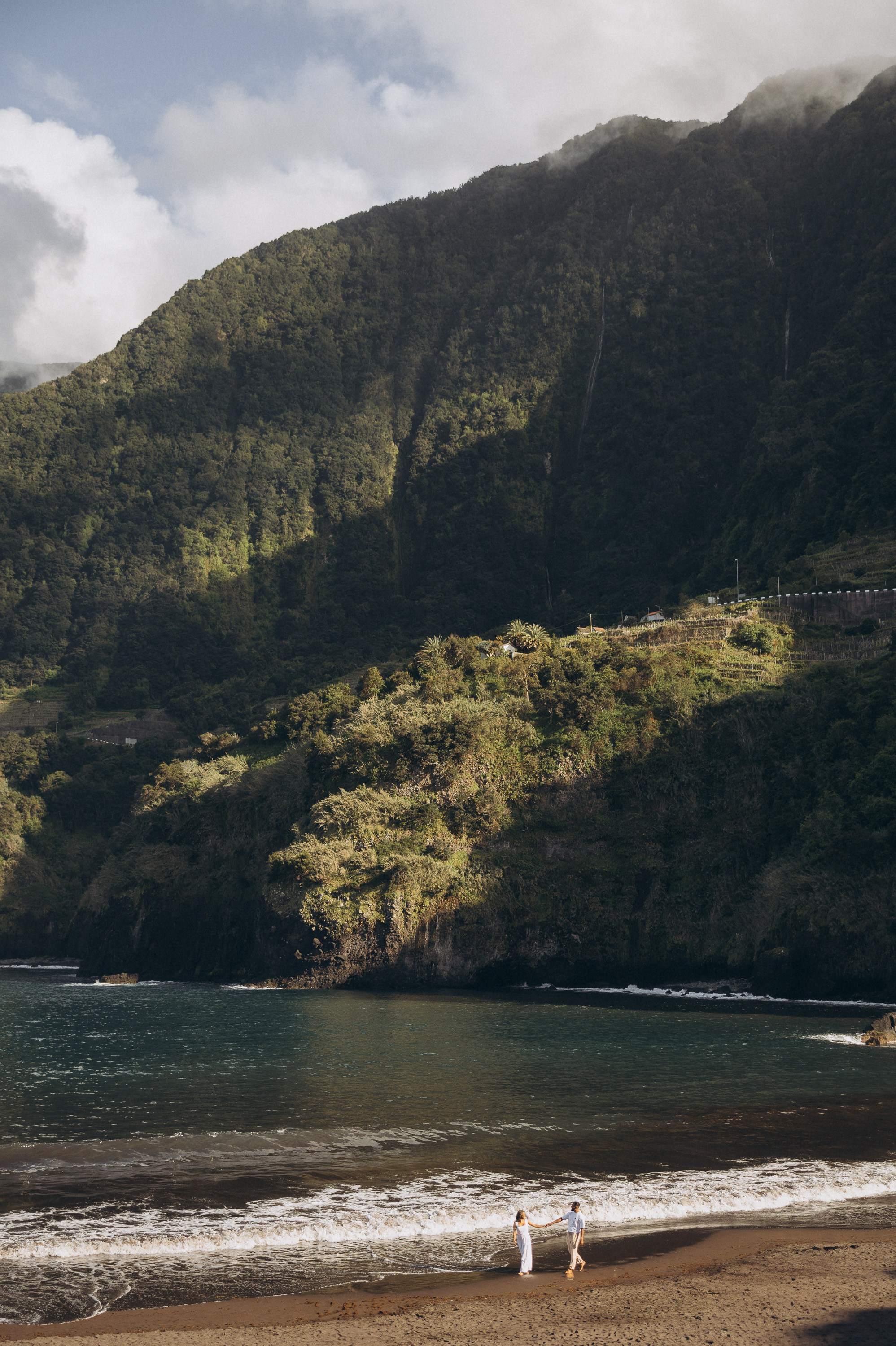 Proposal at Seixal Beach, Madeira — romantic engagement by the ocean, capturing intimate moments on the black sand shore