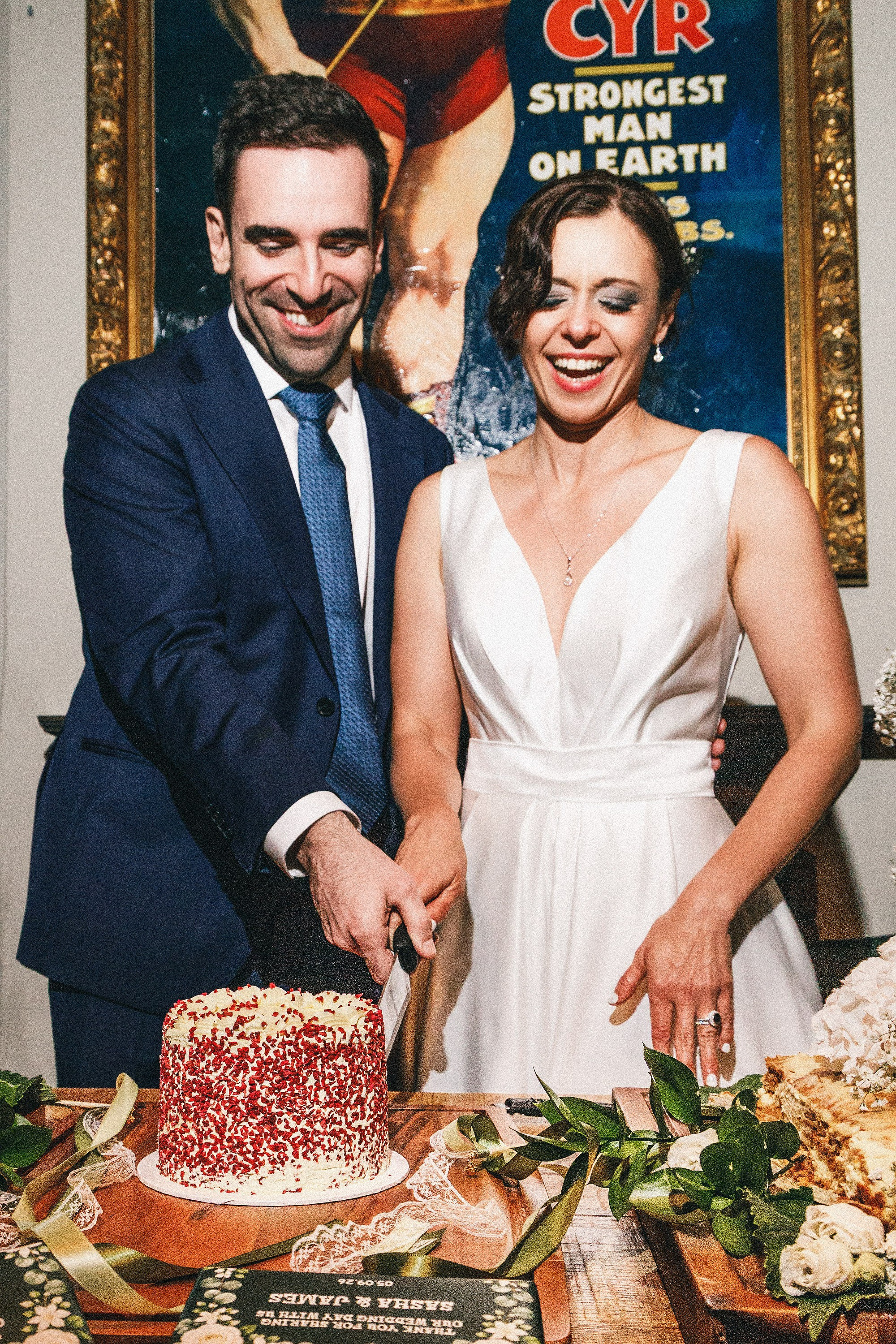 Newlyweds cutting their wedding cake at The Hercules, Lambeth