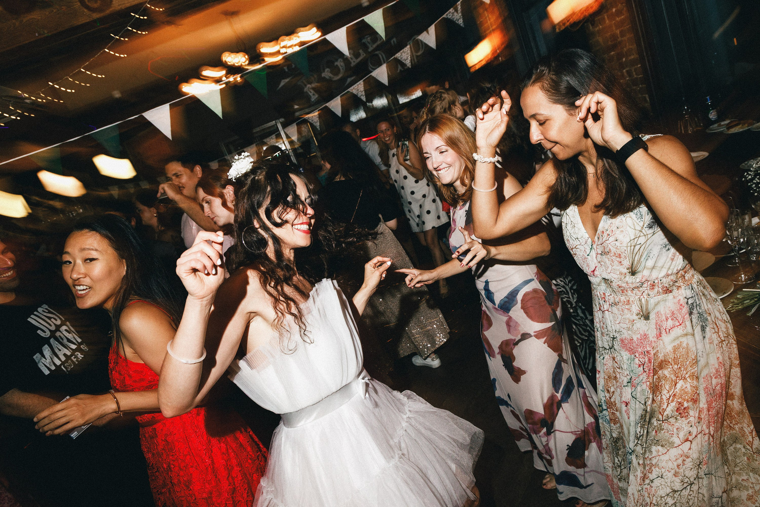 Bride dancing with wedding guests at The Hercules in Lambeth