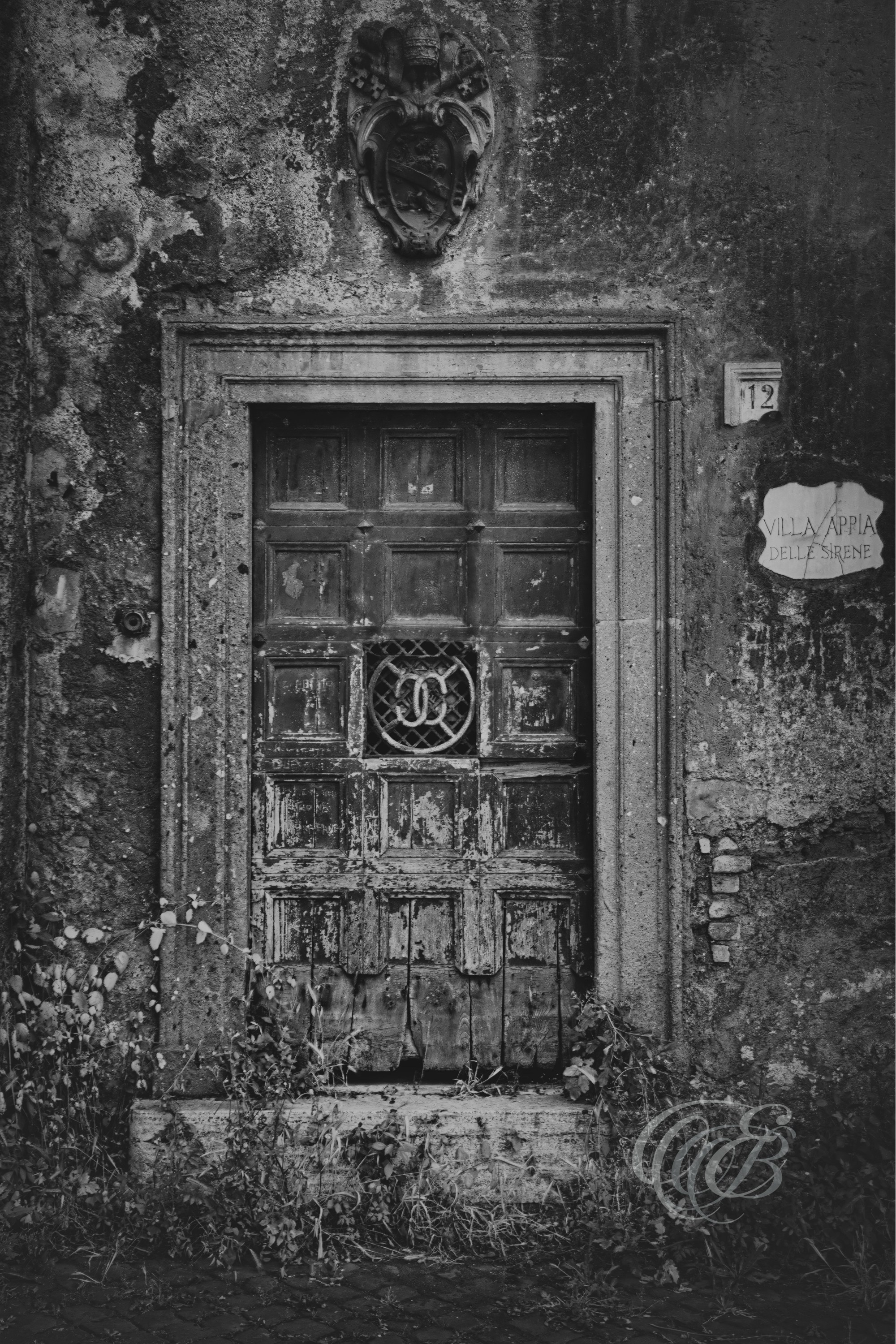 Rome Italy - Villa Appia Delle Sirene - Eduardo Bartoli Fine Art Photography - Eroded door along the Via Appia, captured in black and white fine art photography by Eduardo Bartoli.