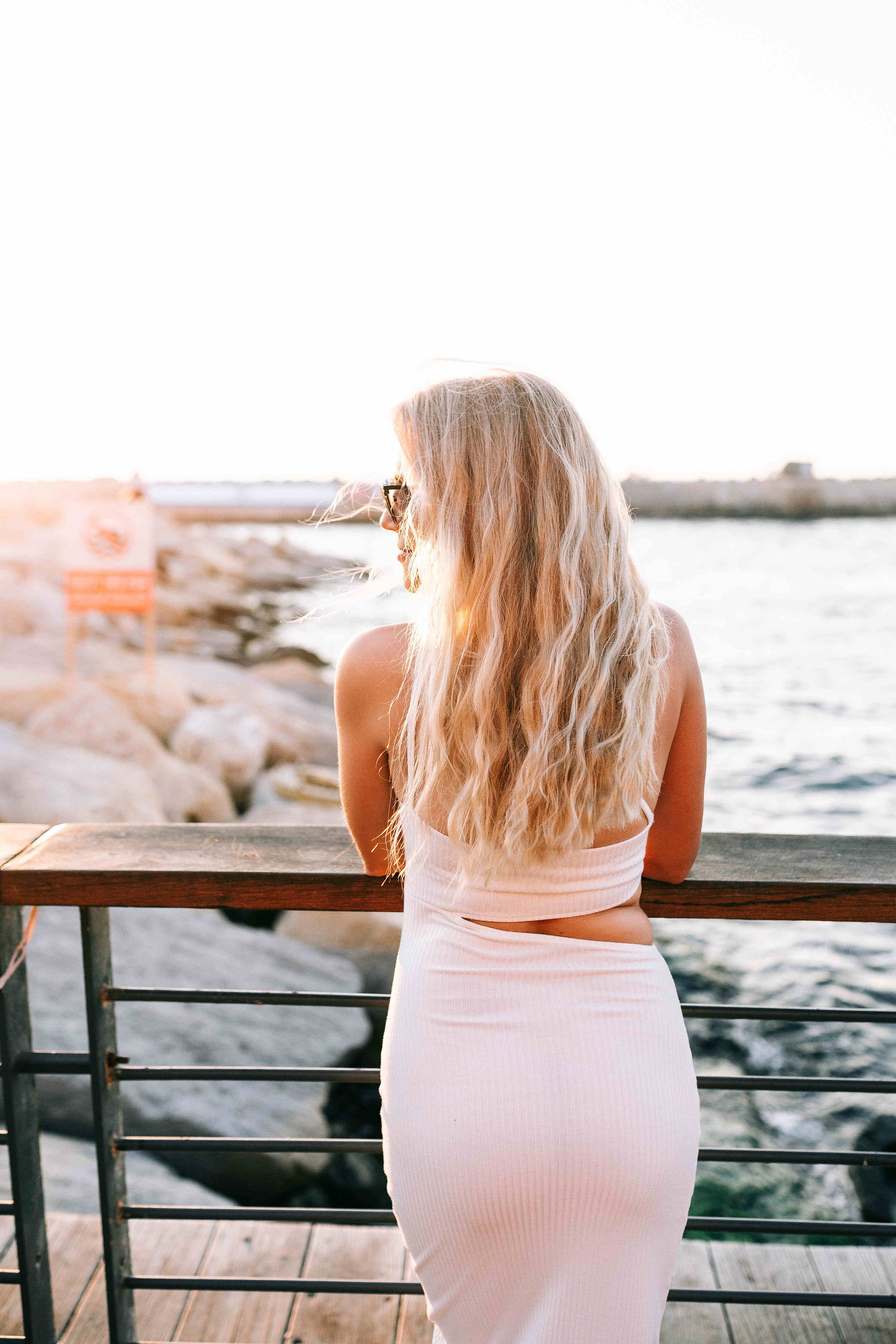 SUNSET IN JAFFO PORT. PHOTOGRAPHER IN ISRAEL