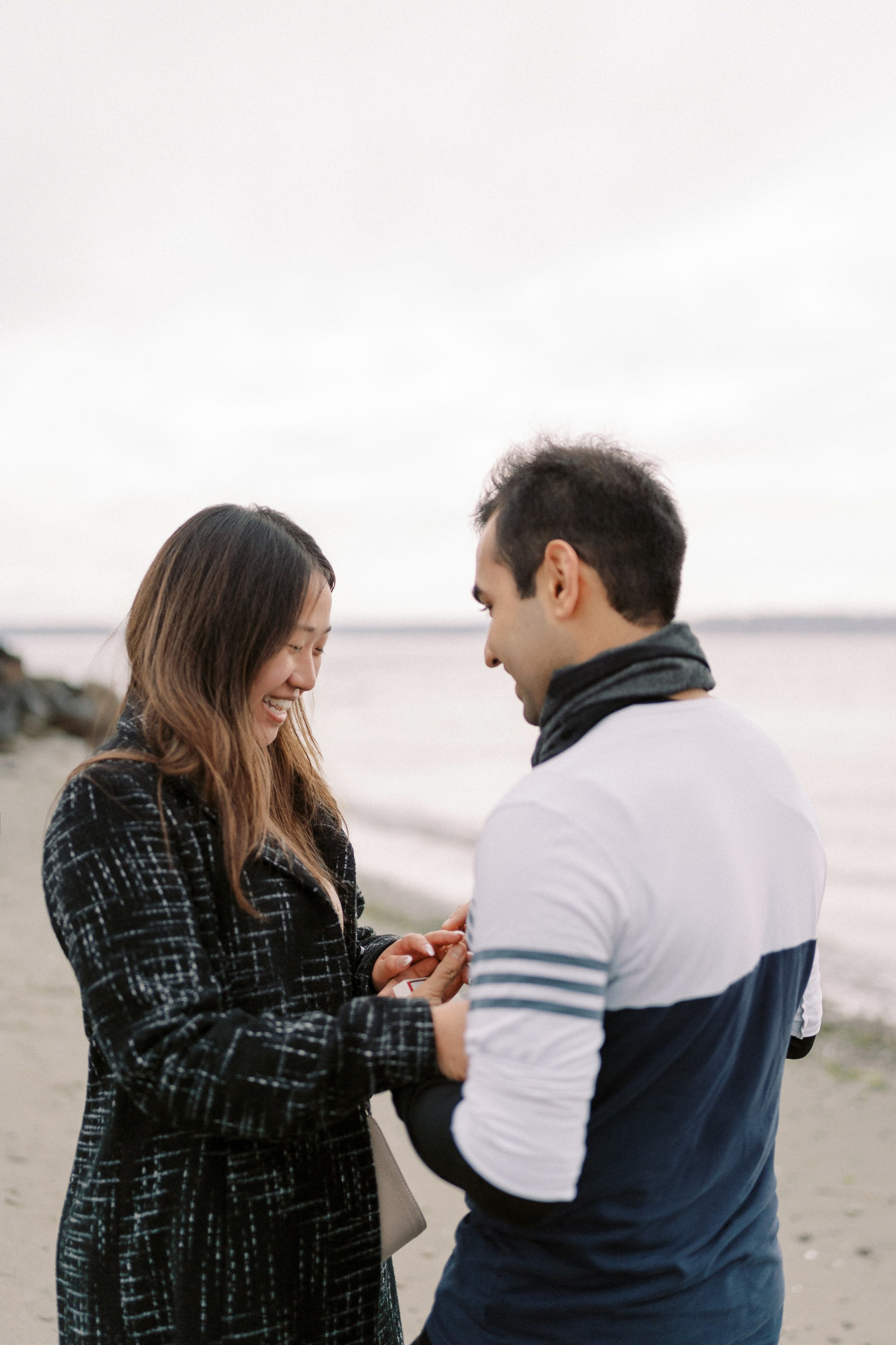 Proposal. December 2024. Alki Point Lighthouse, Washington state. EVAN ARISTOV WEDDING PHOTOGRAPHY — Seattle Wedding Photographer