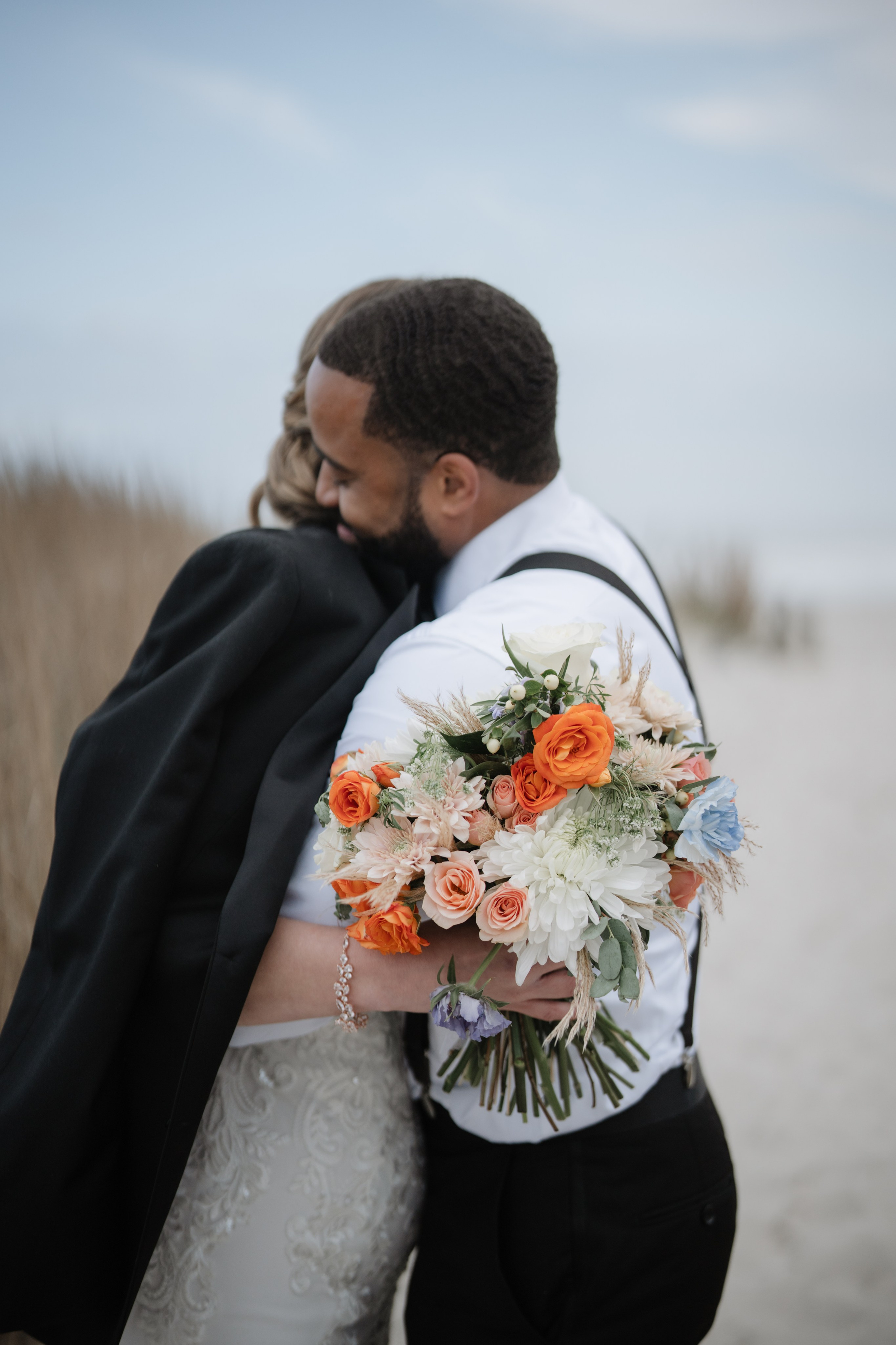 Wedding walk on the beach. Portrait and wedding photographer in New York