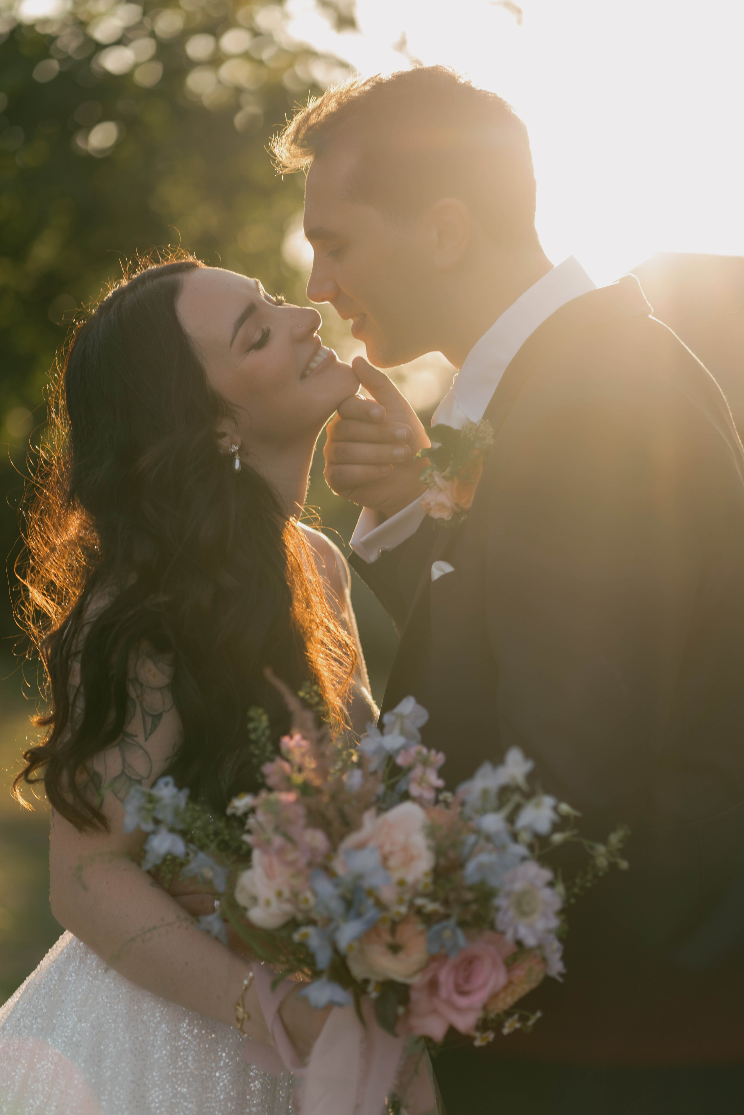     bride and groom portrait Layer Marney Tower golden hour wedding
