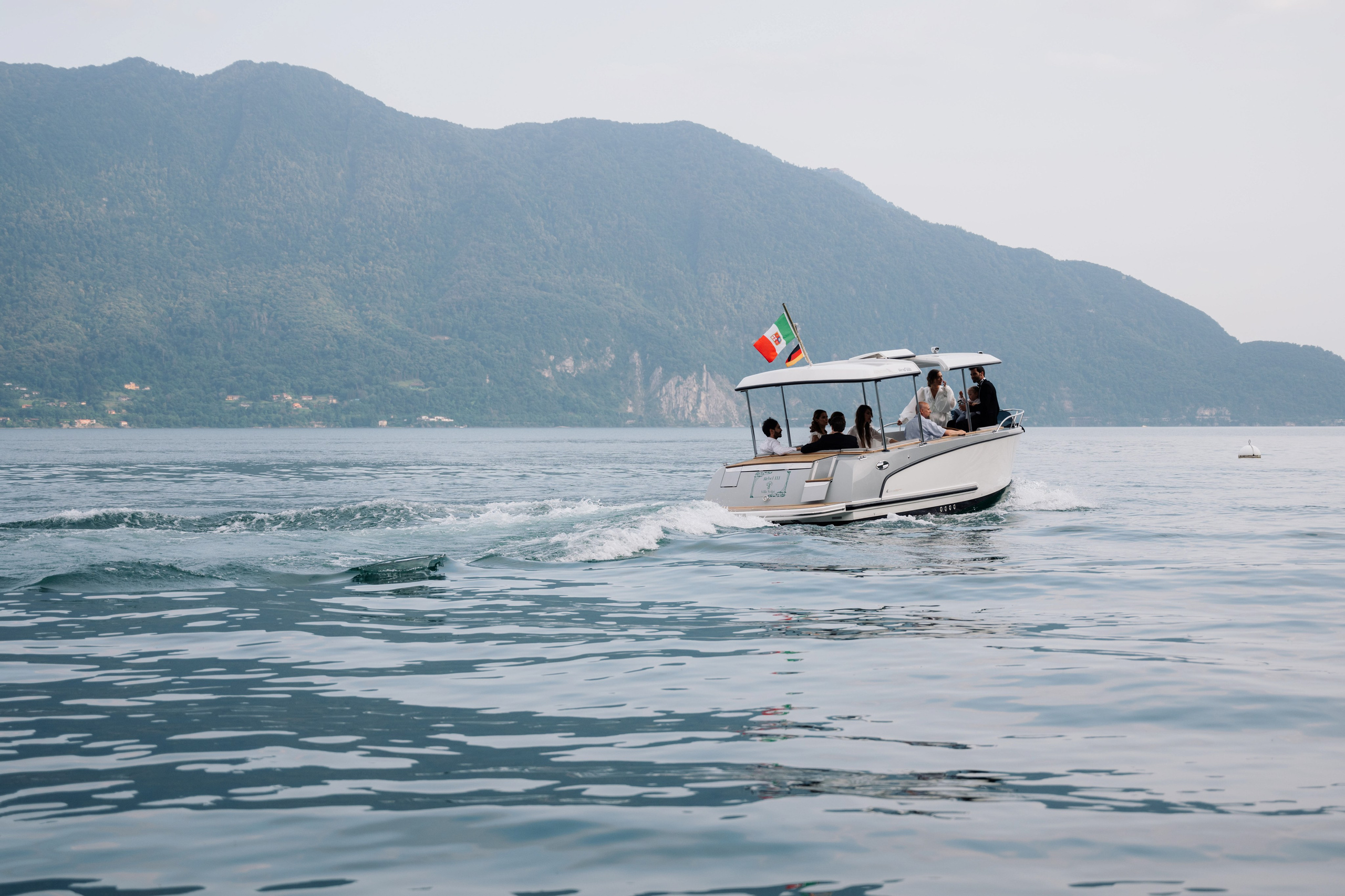 a boat with people on it is in the water