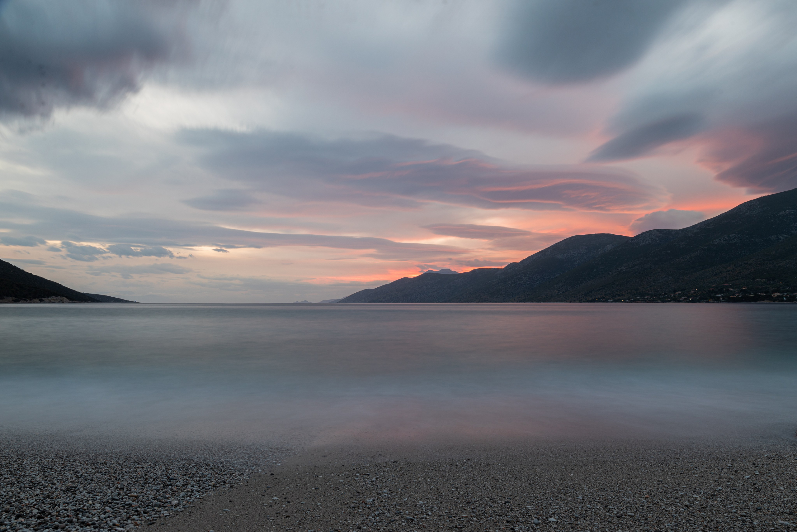 Porto Germeno sunset, Aigosthena Greece, West Attica landscape photography, Gulf of Corinth sunset, long exposure beach photography, Mount Kithaeron, Greek coastal scenery.