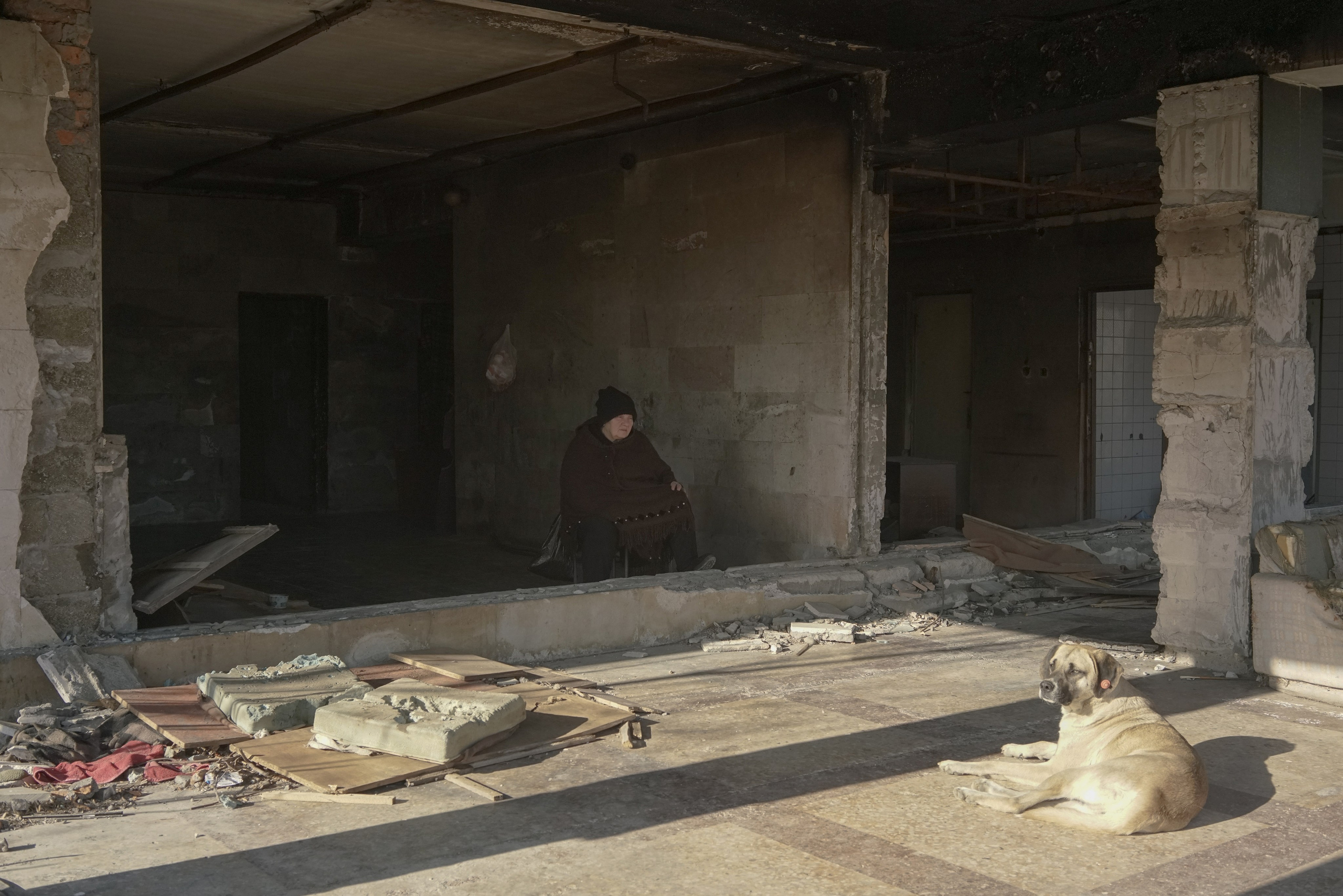 The  woman in an abandoned sanatorium "Sakartvelo". After the war in Abkhazia, thousands of Georgians were forced to leave their homes. In Georgia, they were settled in former Soviet sanatoriums. Over time, everyone got new apartments, but some cannot leave the sanatoriums that have become their own. Every day a woman comes to an abandoned sanatorium where she has lived for 30 years to feed the dogs and cats left there.