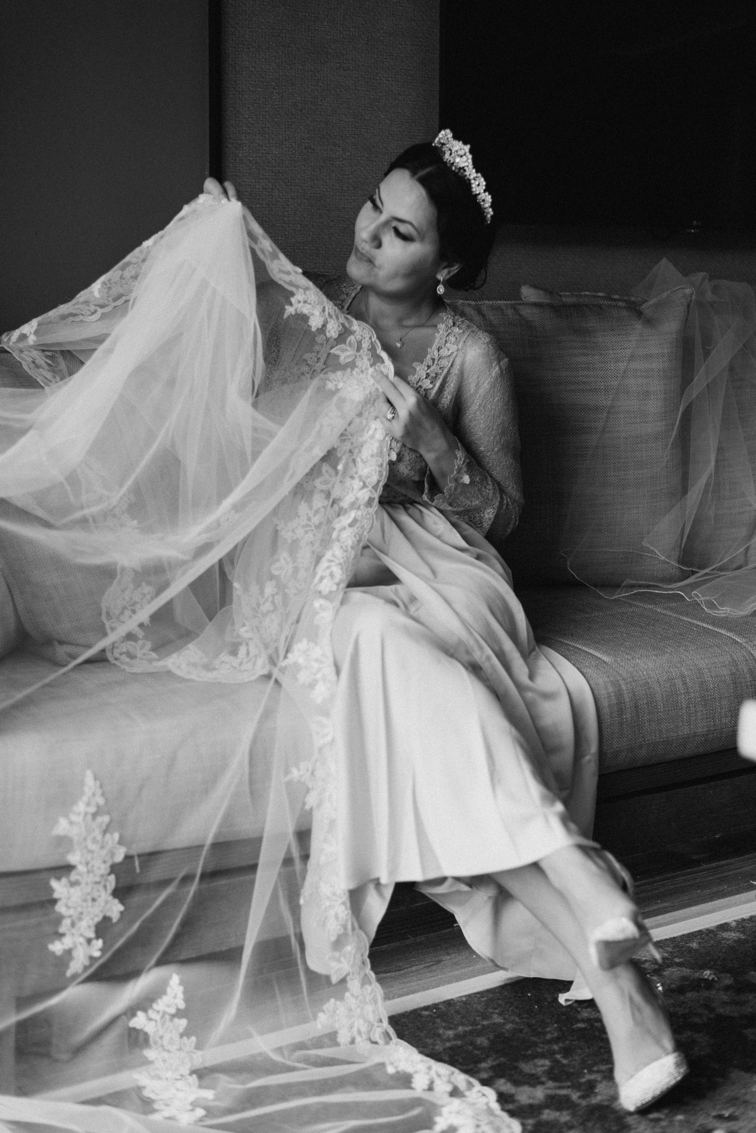 Bride smiling in Malta farm field with sunset.
