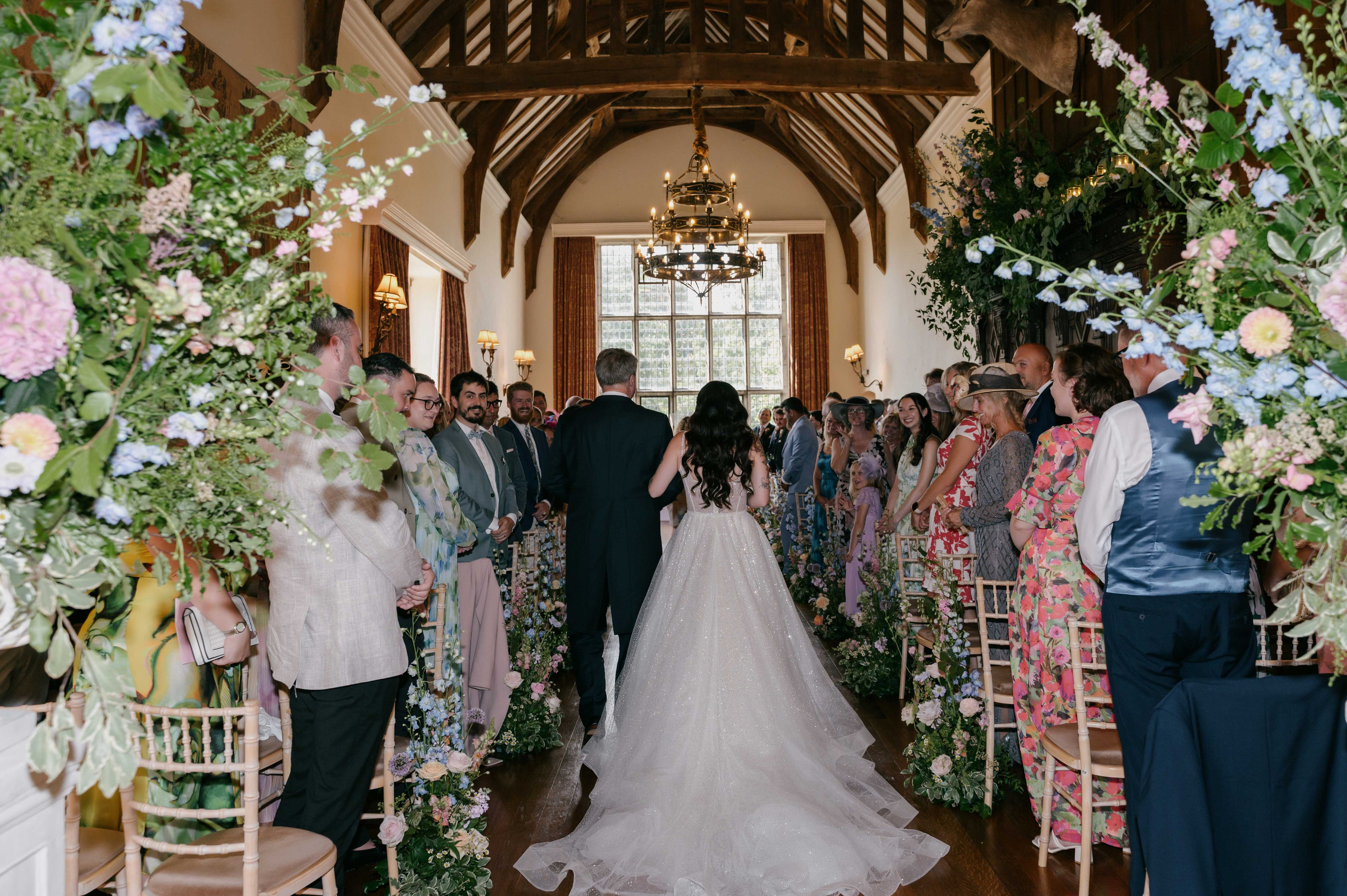     wedding ceremony with floral arch Essex UK