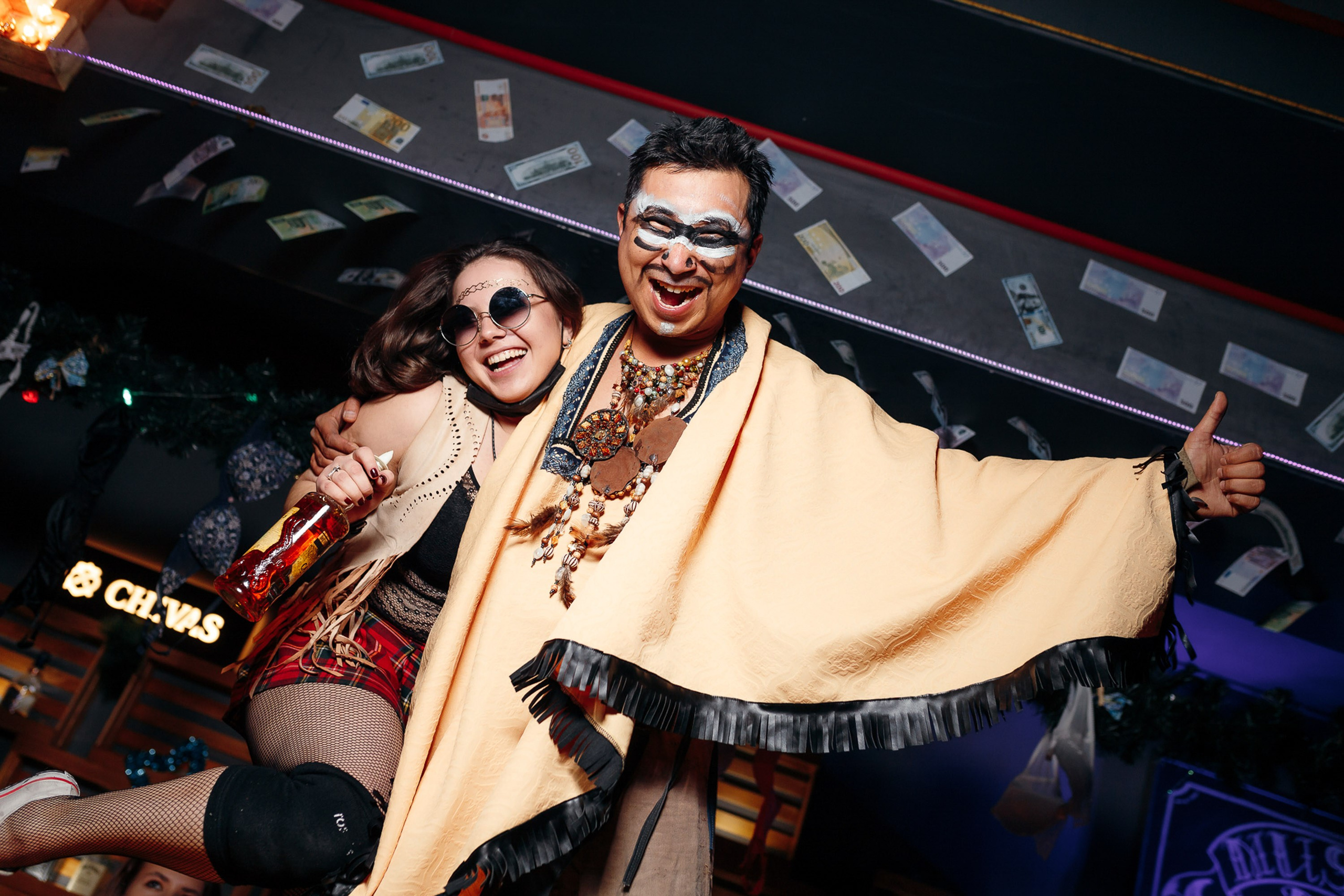 People singing together on stage, lively karaoke scene