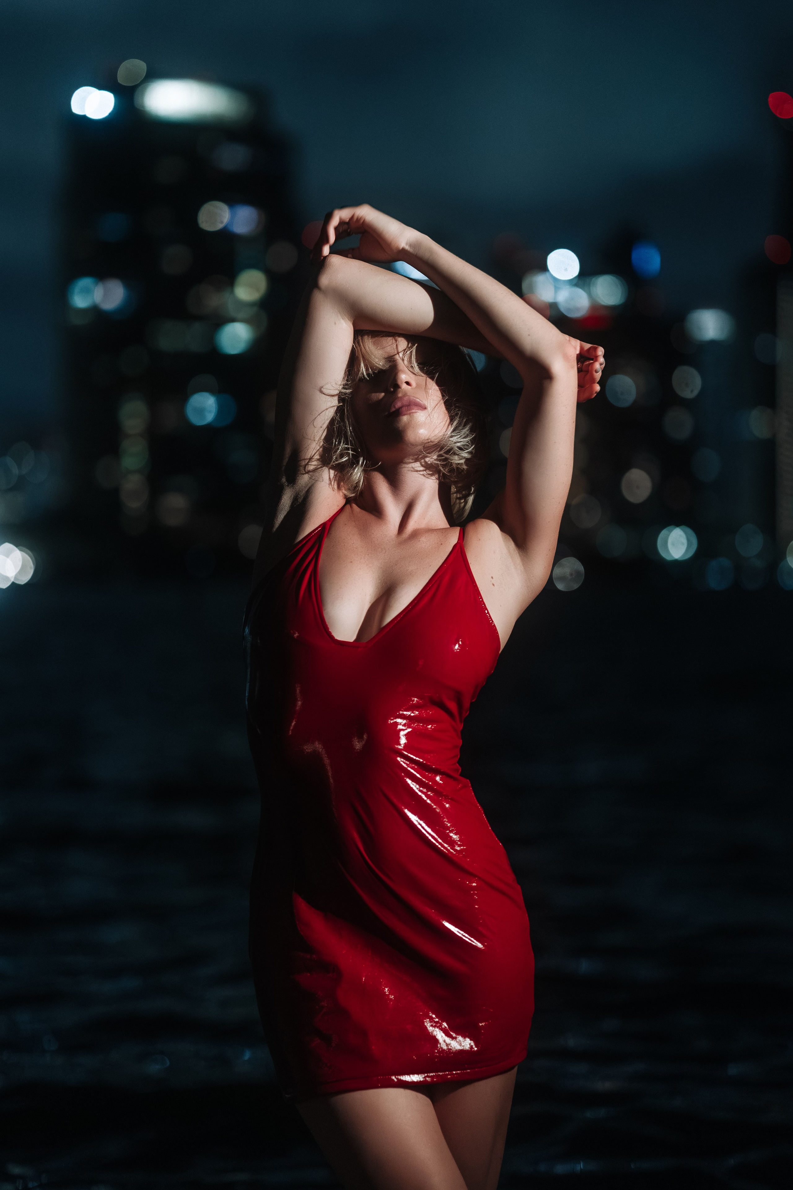 Shot by the bay with cool-toned water and warm light on the subject. The contrast enhances atmosphere.