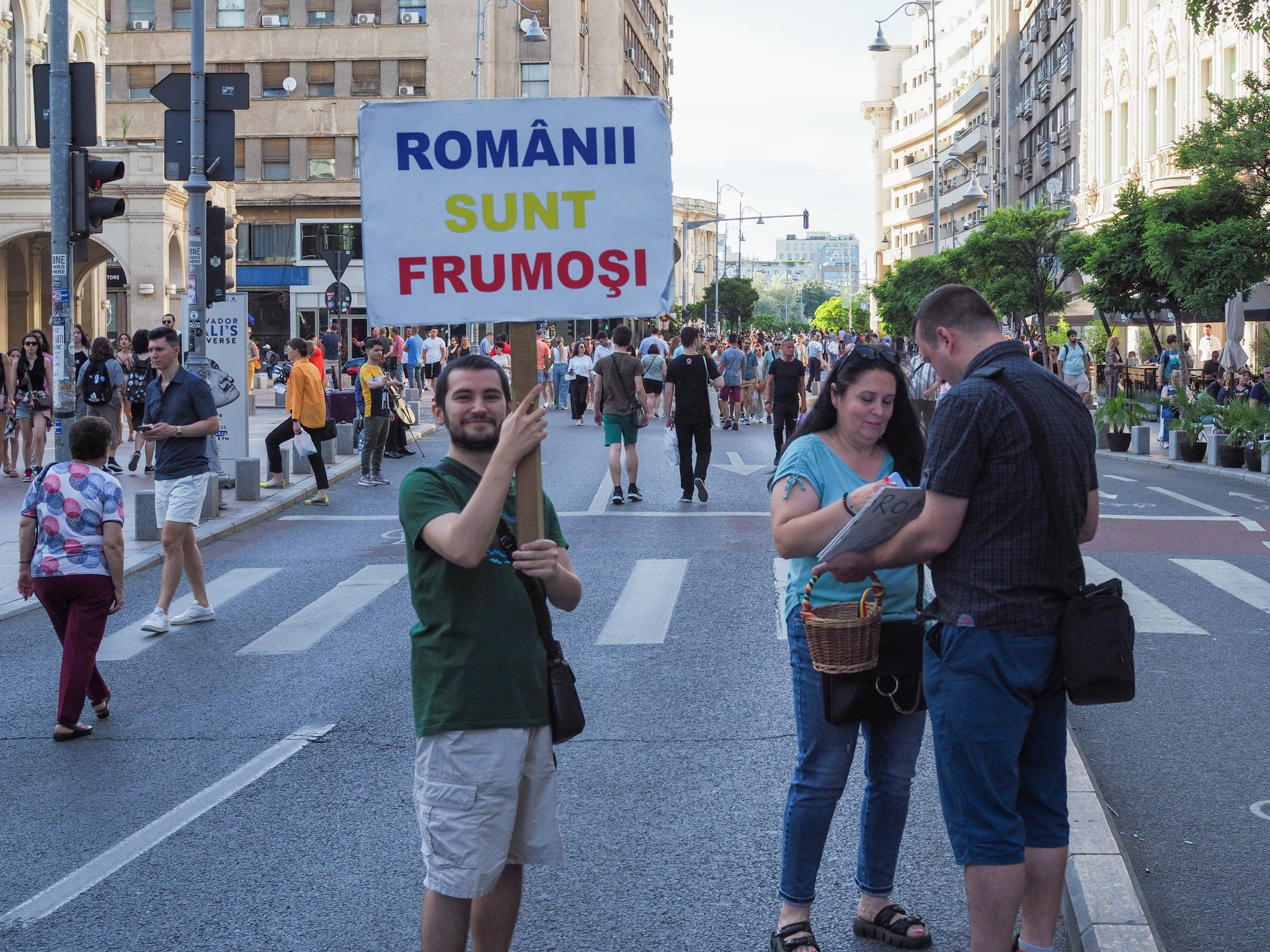 Color street. Humanistic street photographer in Bucharest