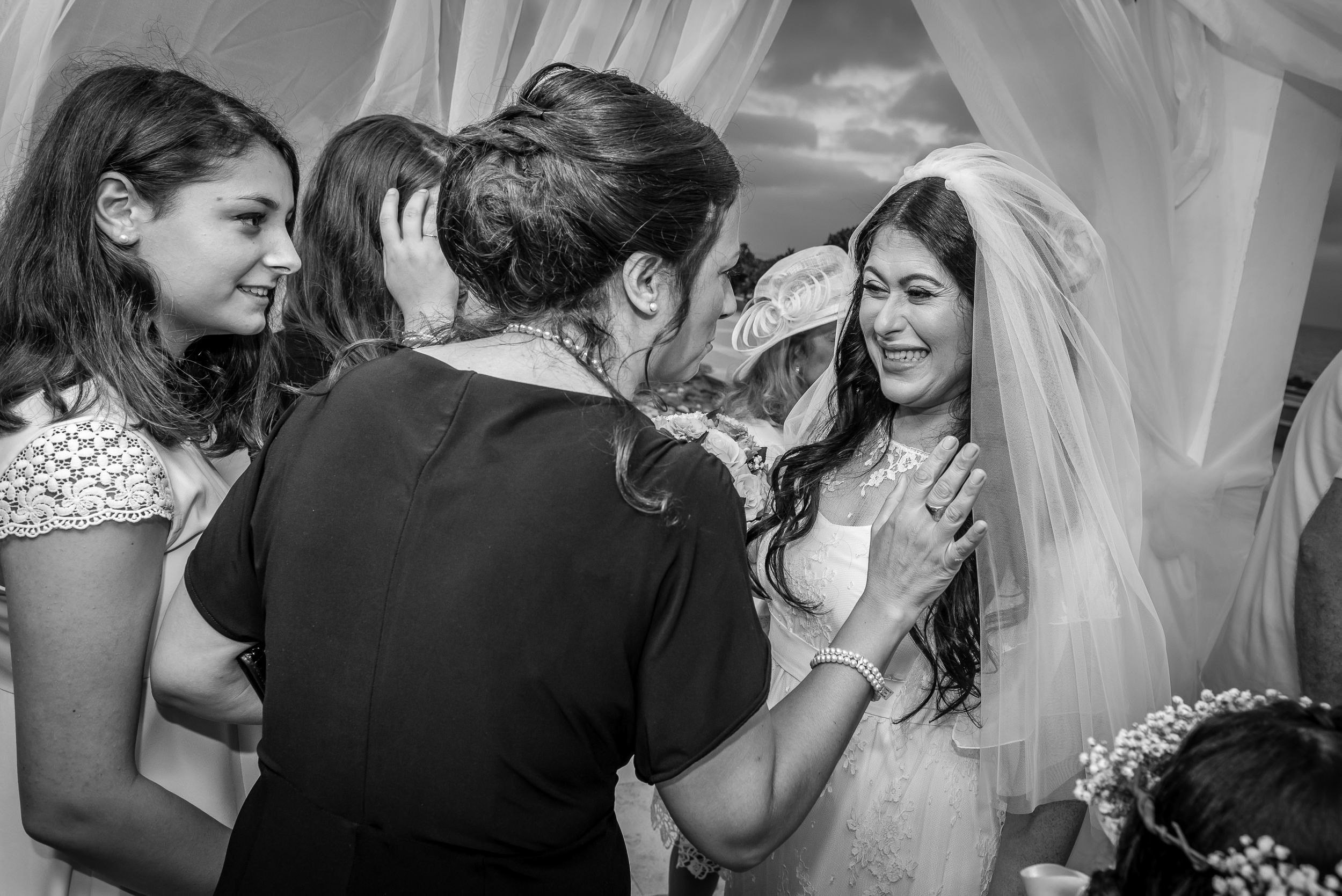 Bride Simone receiving emotional congratulations from guests after her Chuppah ceremony at the Leonardo Hotel in Haifa, Israel