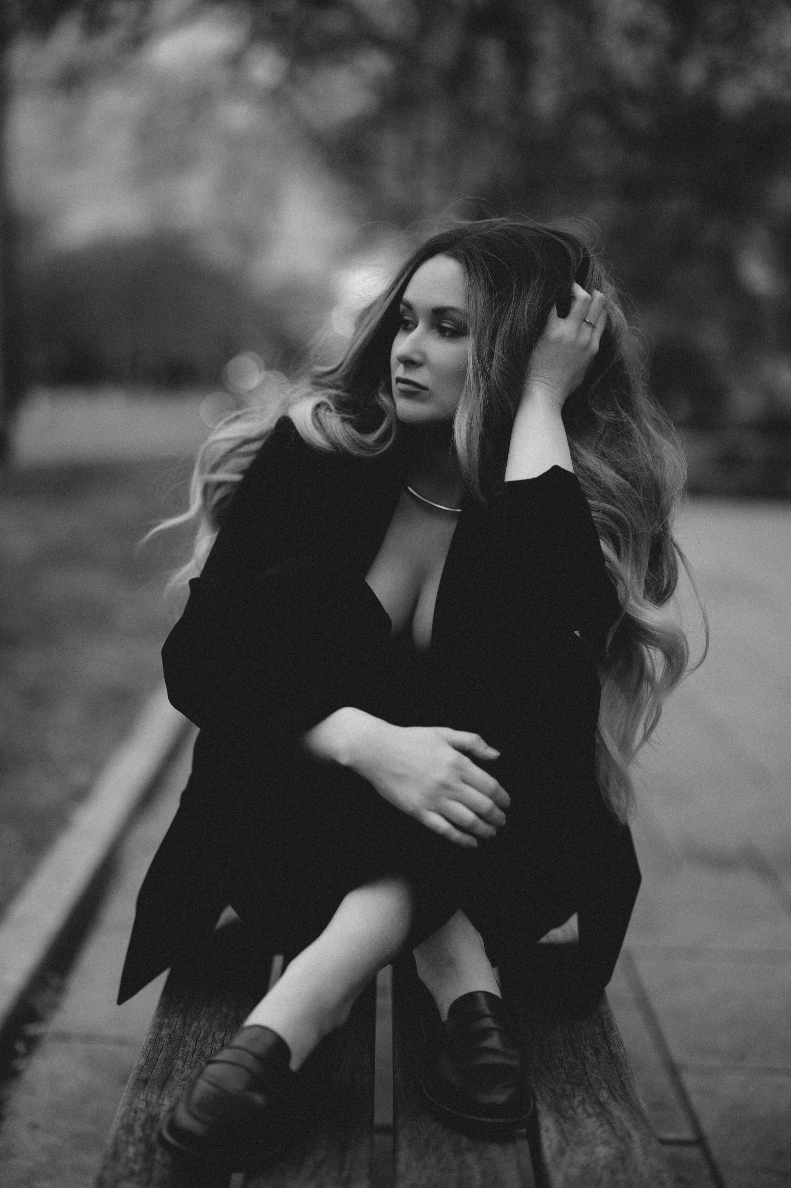 Black&White city walk. Woman in Heels&Black suit. Cinematic Portrait Photography. Kristina Kozheltsova- Soulful Portrait&Lifestyle&Love Story Photographer in Leipzig, Germany