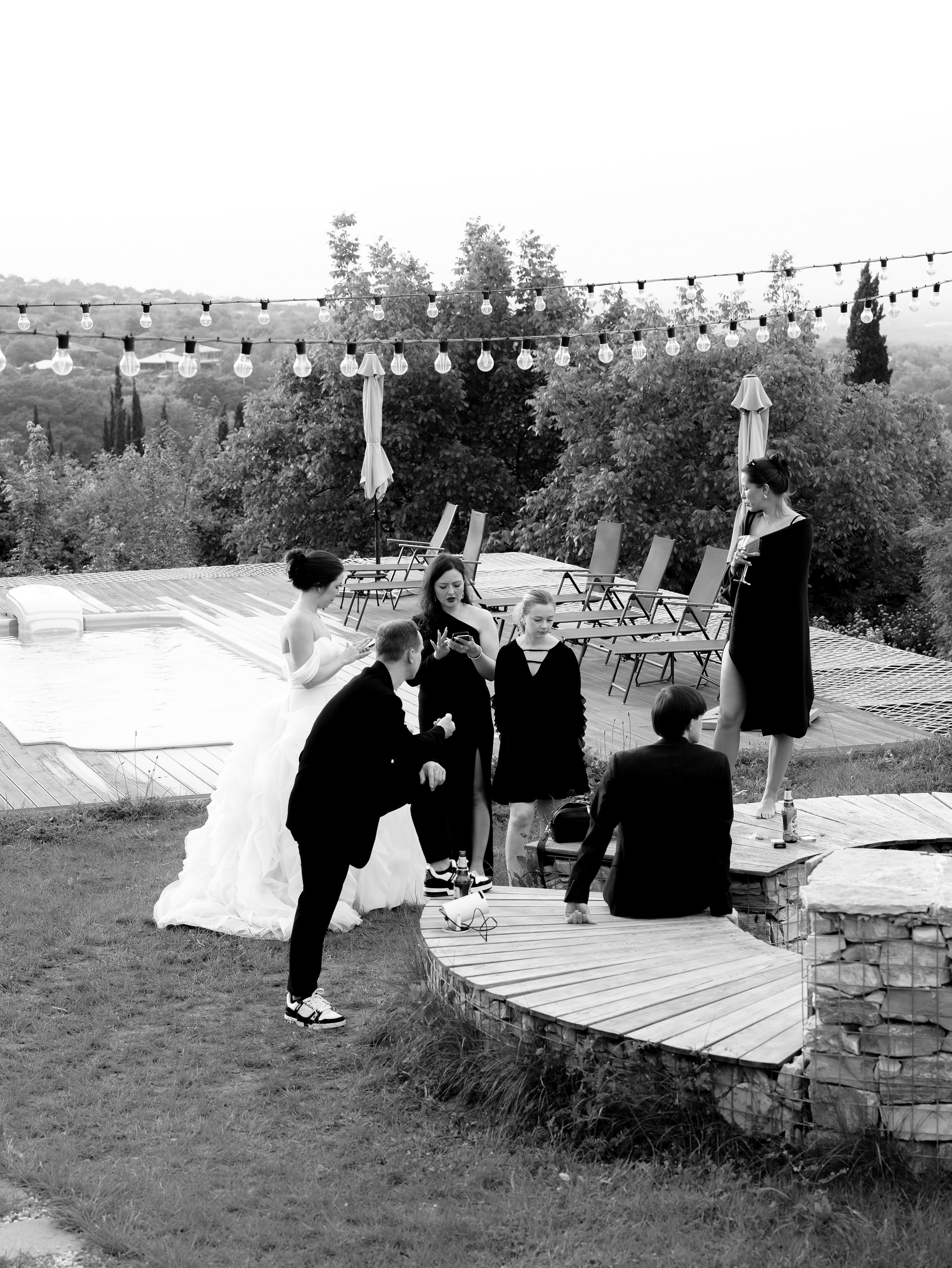 Guests dancing outdoor evening wedding