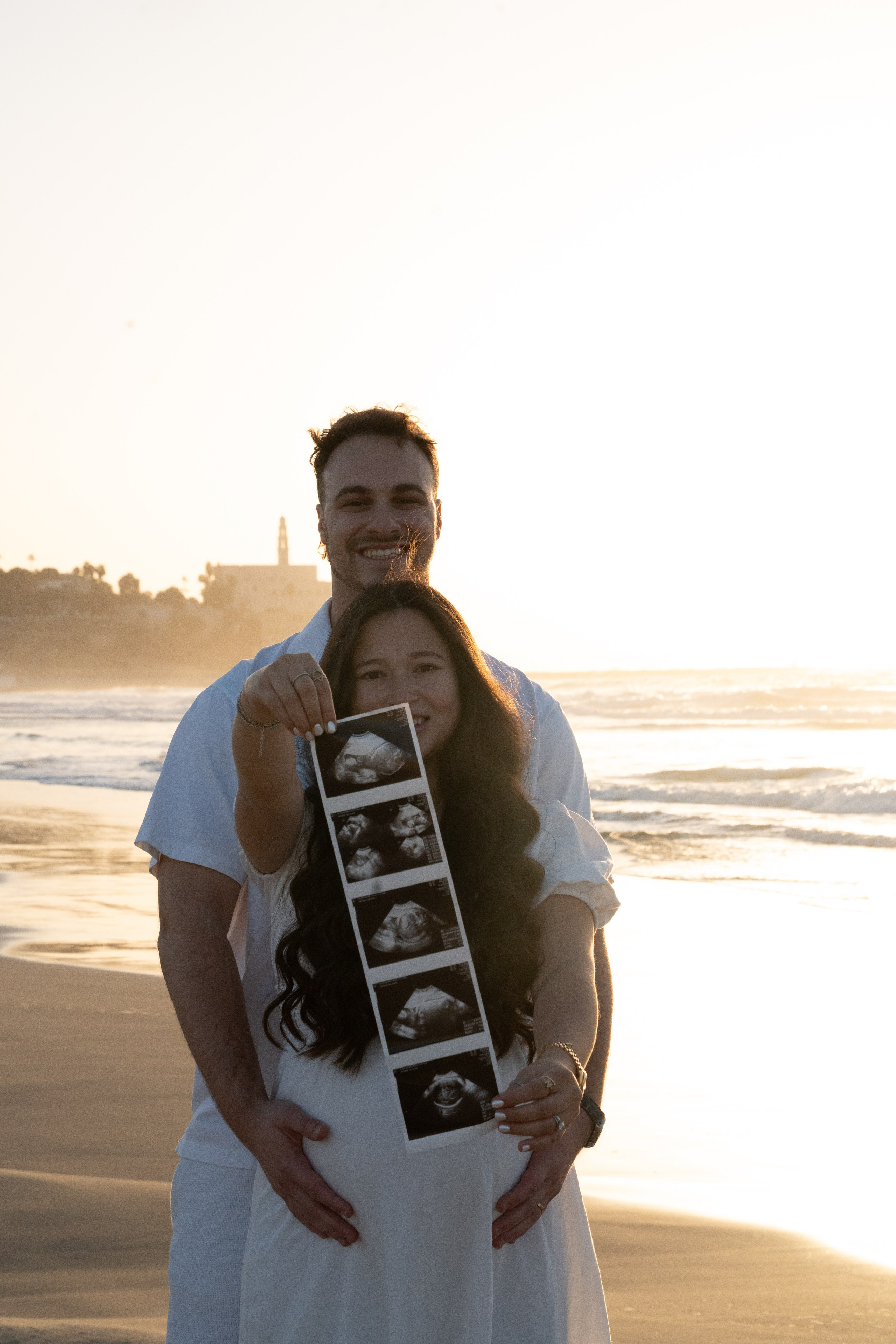 Naomi & Surli, Jaffa Beach, December 2025. Divign By Tehilah — Meaningful Graphic Design & Photography